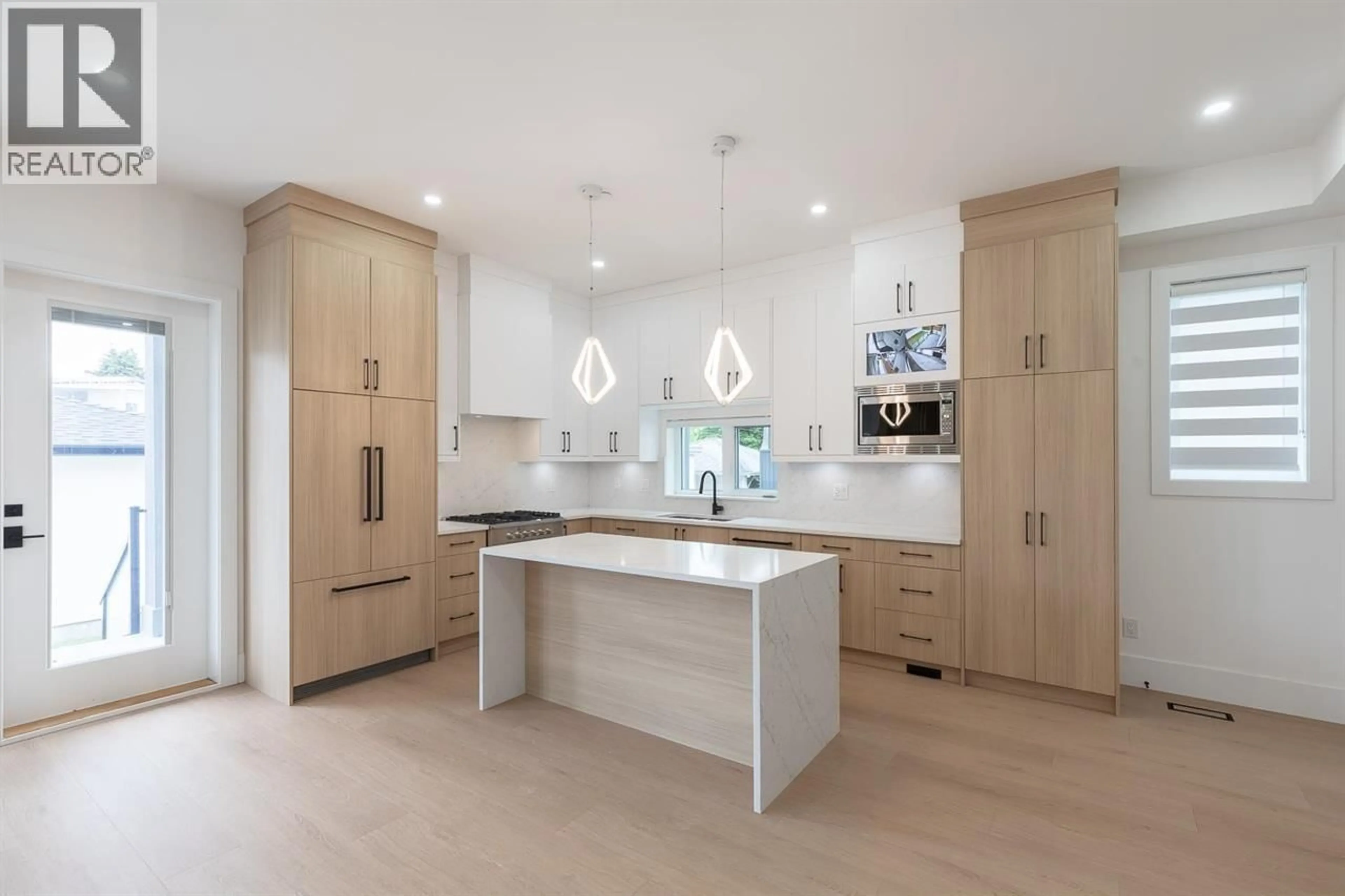 Contemporary kitchen, ceramic/tile floor for 2 - 6964 INVERNESS STREET, Vancouver British Columbia V5X4G5