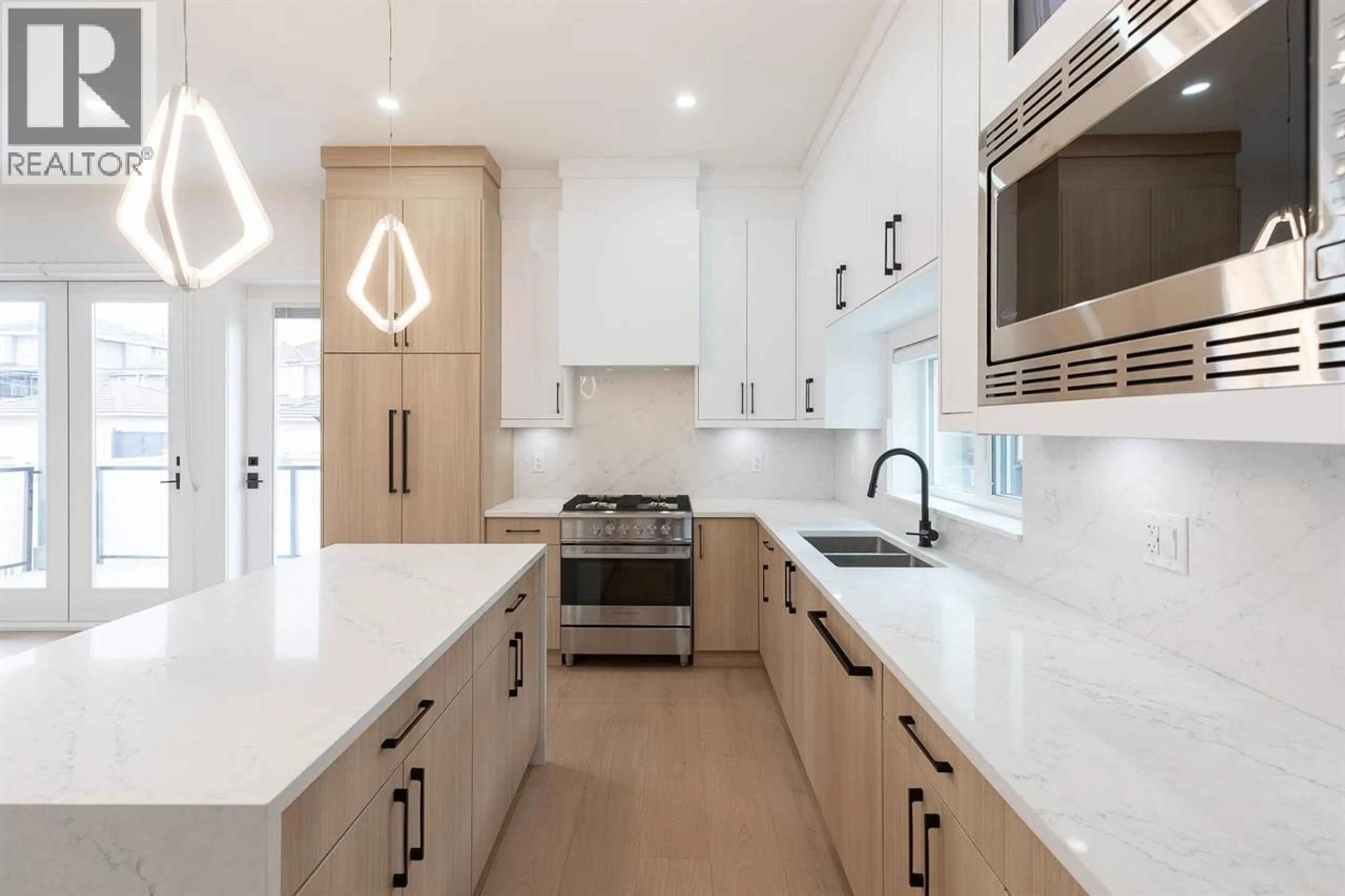 Contemporary kitchen, ceramic/tile floor for 2 - 6964 INVERNESS STREET, Vancouver British Columbia V5X4G5