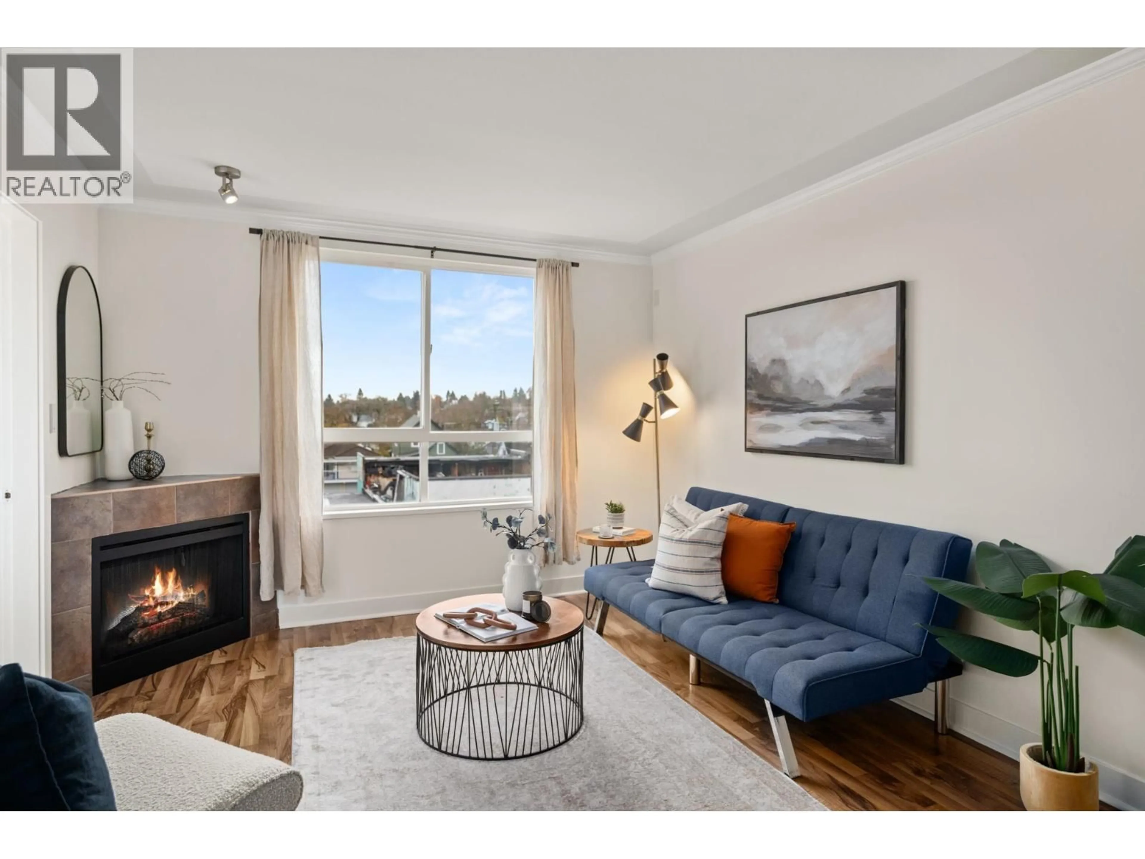 Living room with furniture, wood/laminate floor for PH6 - 2265 HASTINGS STREET, Vancouver British Columbia V5L1V3