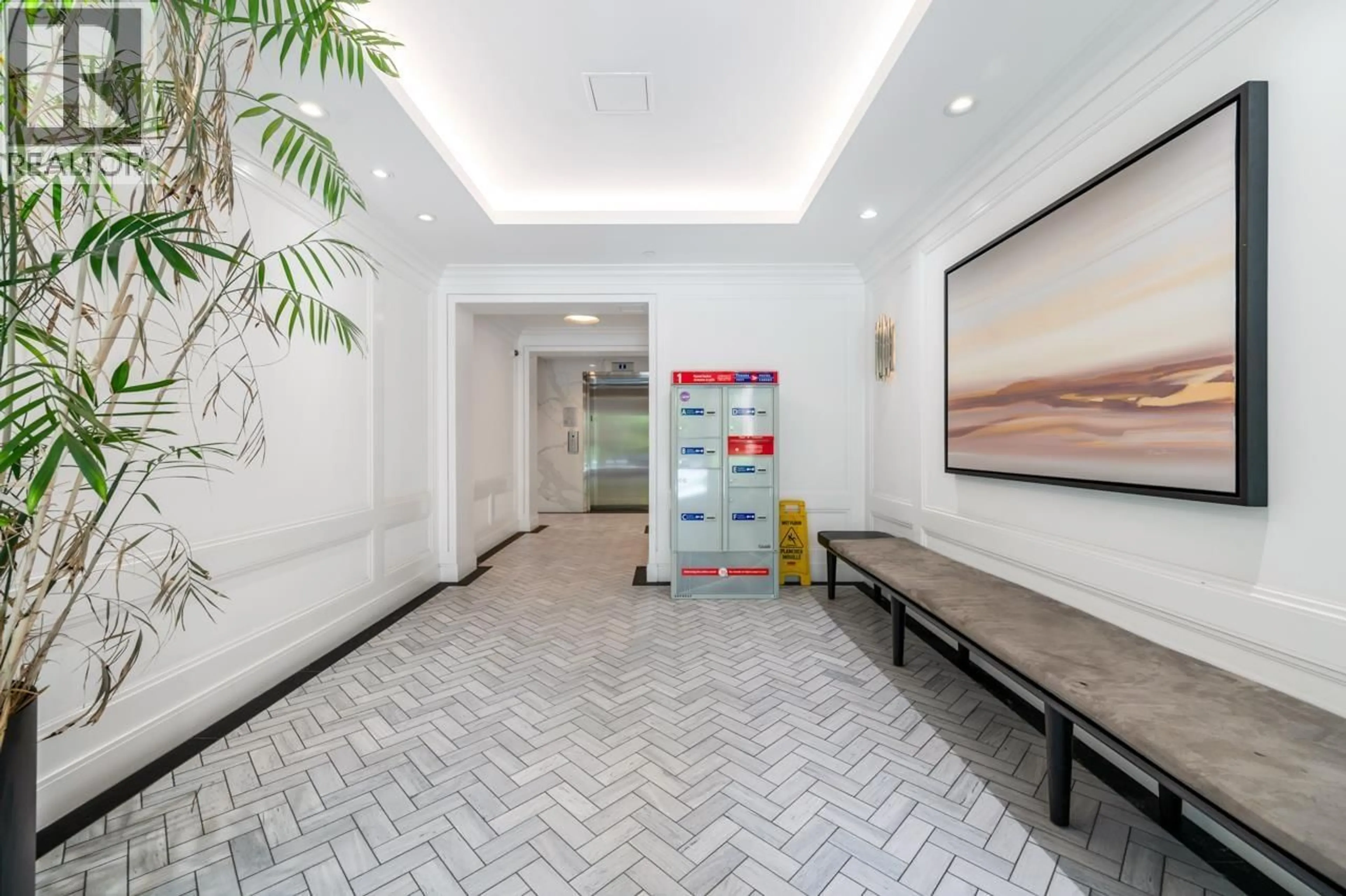 Indoor foyer for 205 - 6933 CAMBIE STREET, Vancouver British Columbia V6P0J1