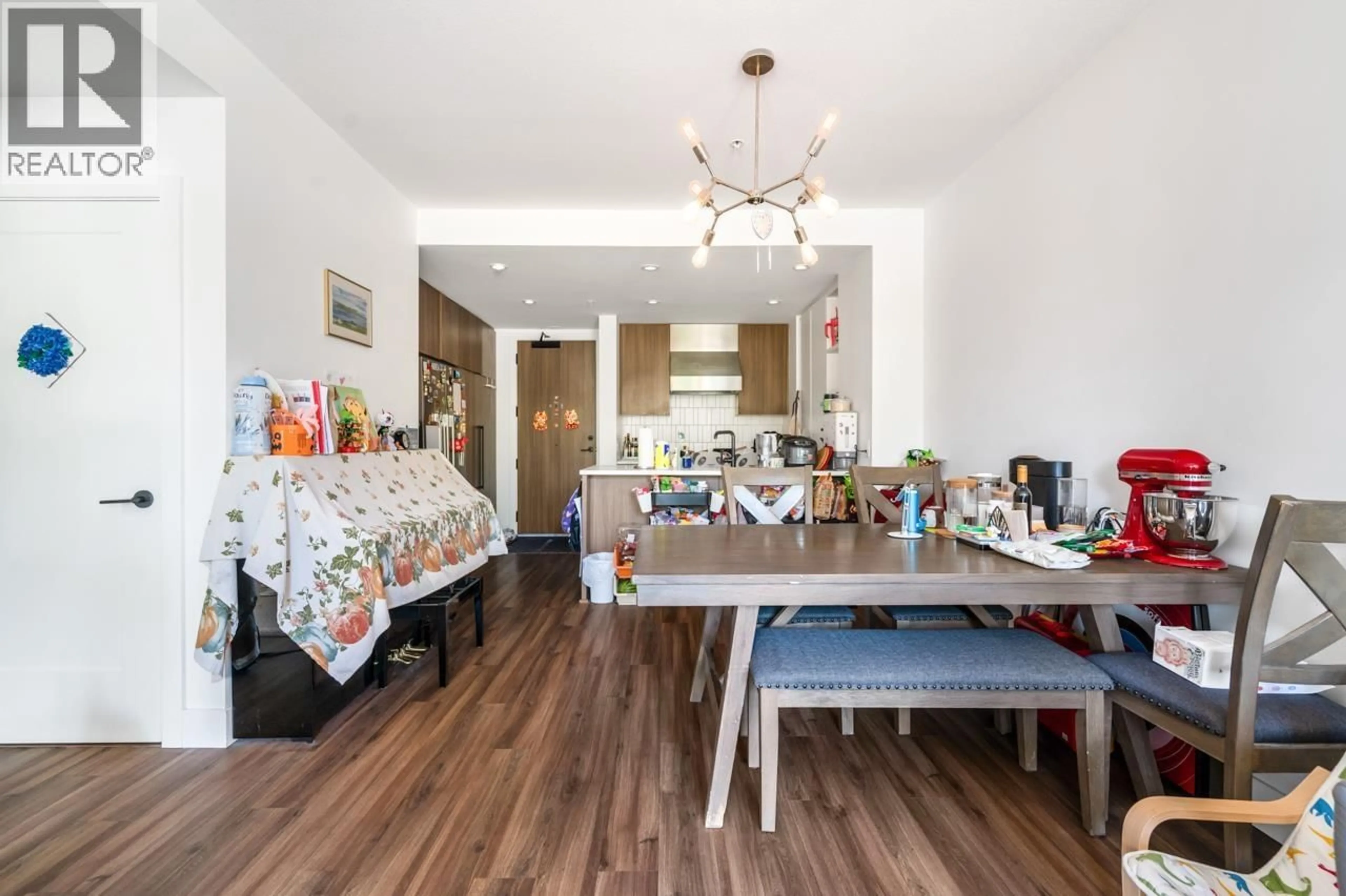 Dining room, wood/laminate floor for 205 - 6933 CAMBIE STREET, Vancouver British Columbia V6P0J1