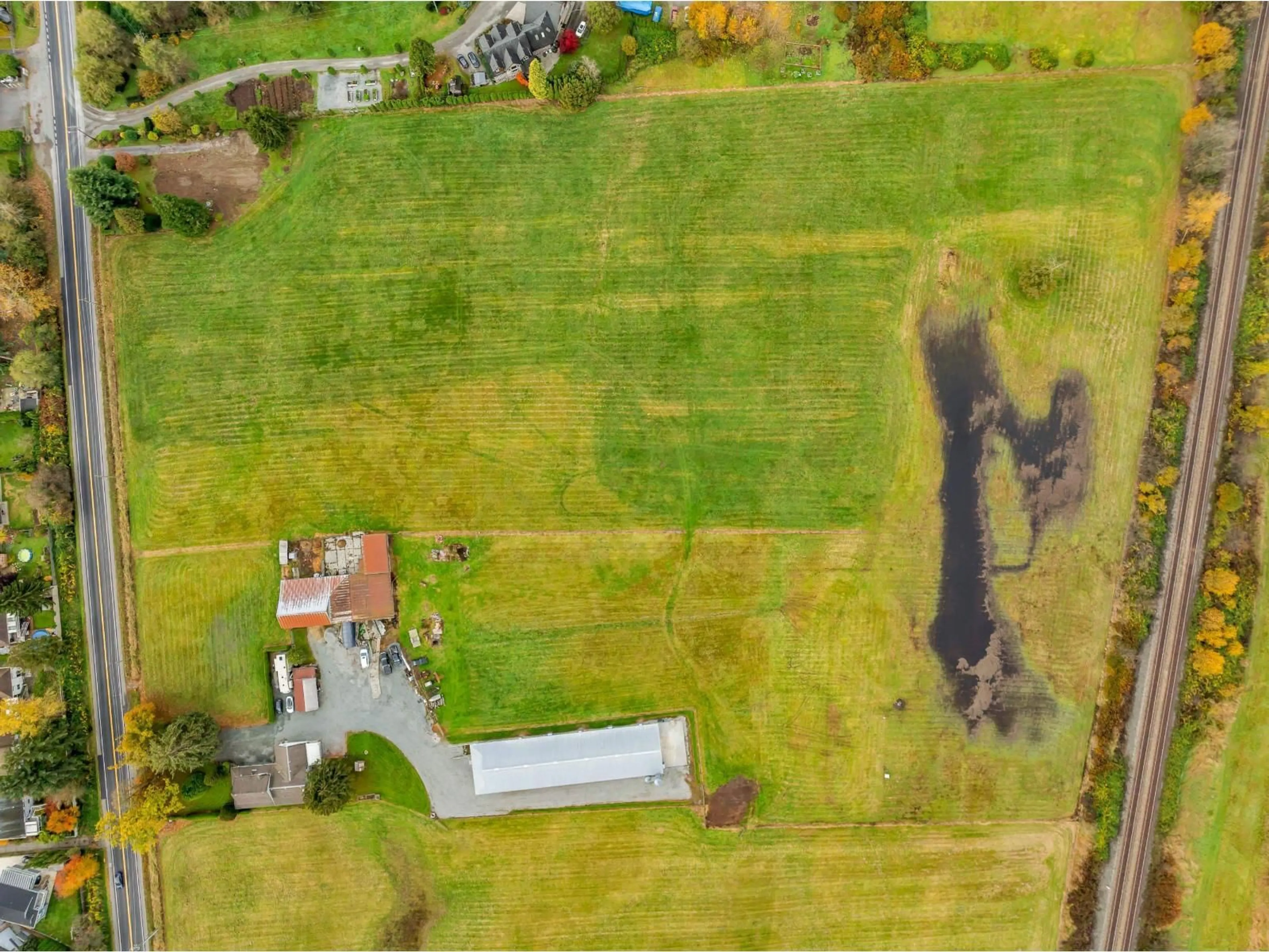 A pic from outside/outdoor area/front of a property/back of a property/a pic from drone, water/lake/river/ocean view for 21293 96 AVENUE, Langley British Columbia V1M2Z4