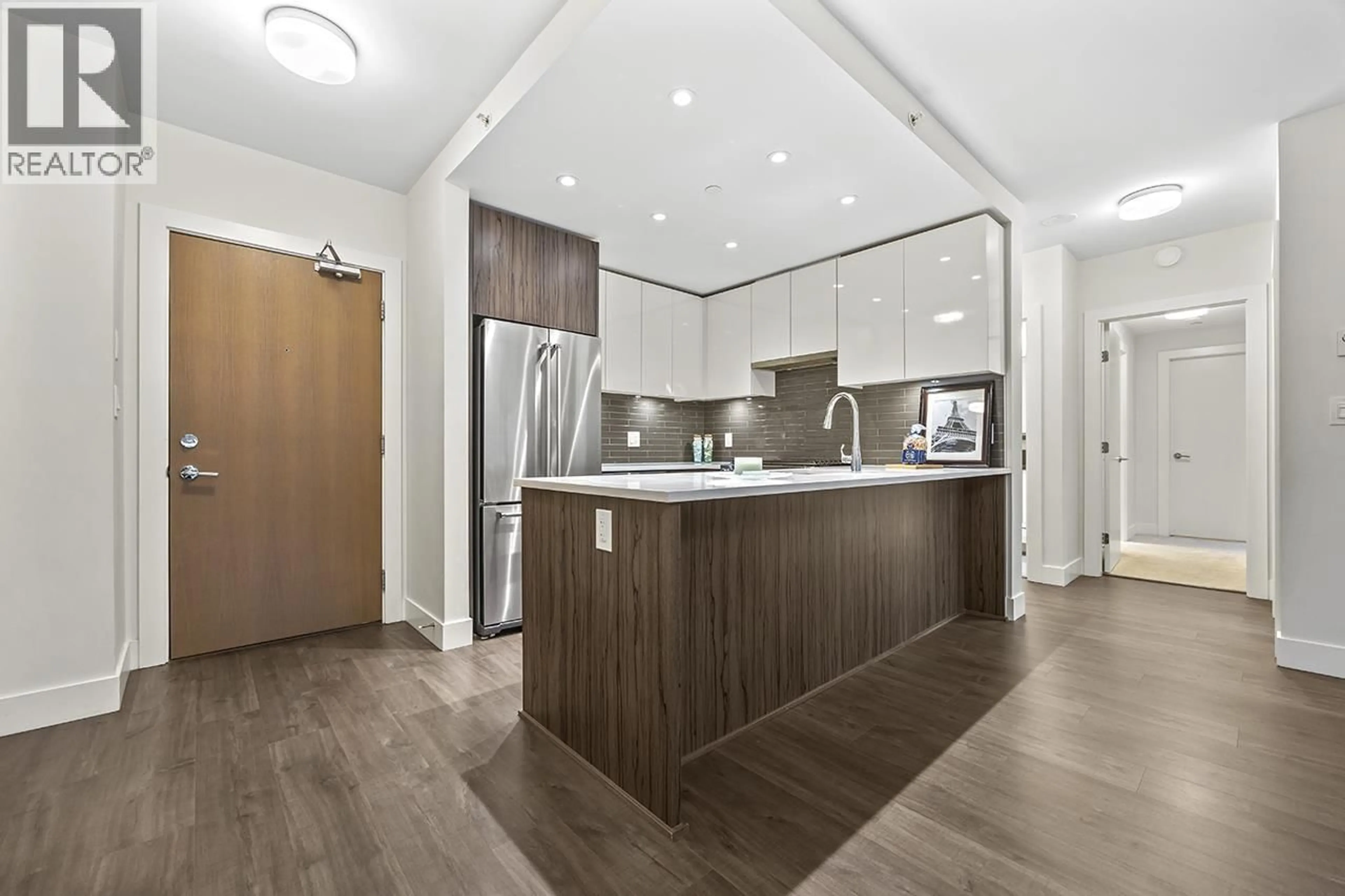 Open concept kitchen, wood/laminate floor for 407 - 258 NELSON'S COURT, New Westminster British Columbia V3L0J9