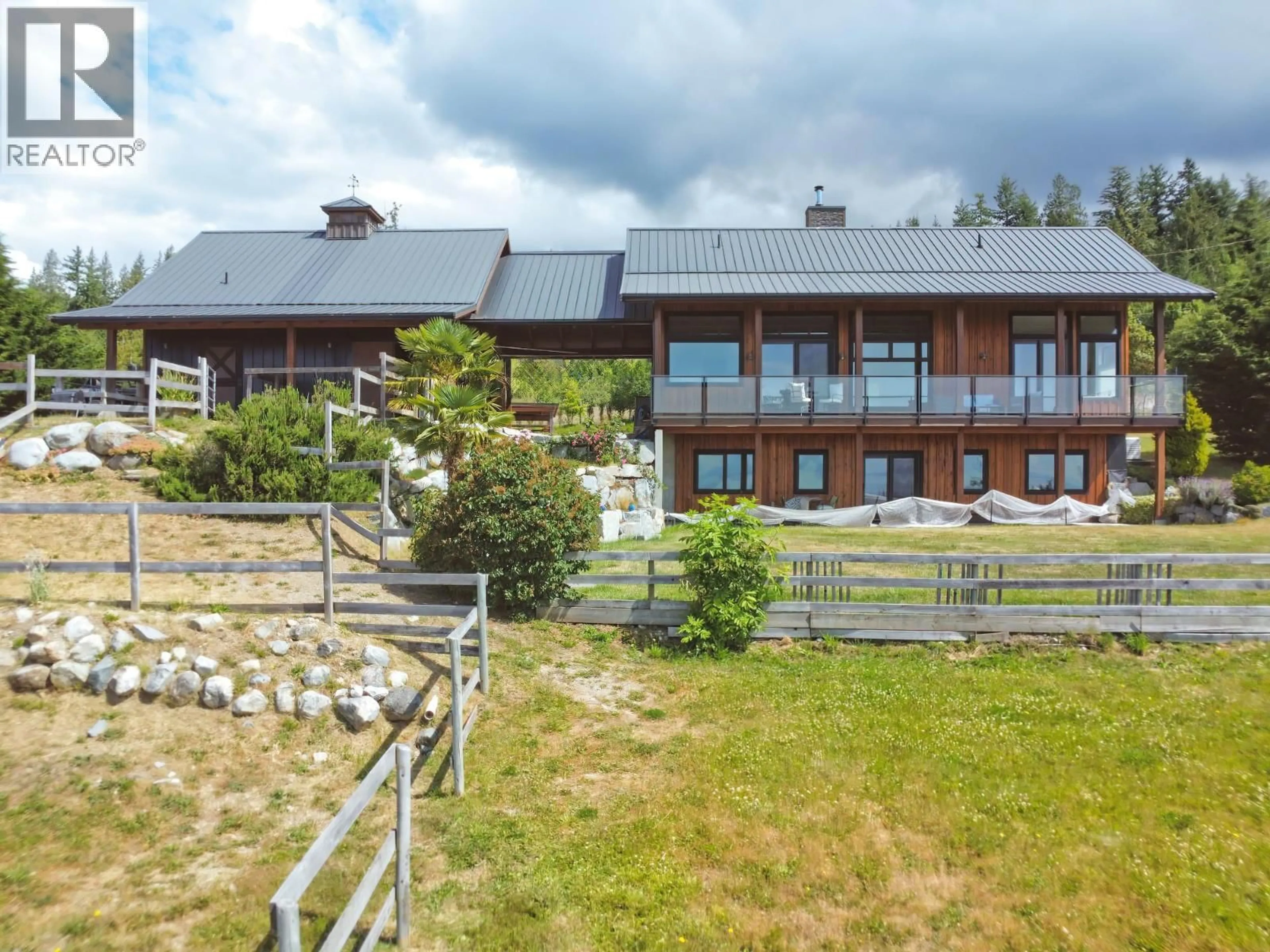 A pic from outside/outdoor area/front of a property/back of a property/a pic from drone, building for 2247 PIXTON ROAD, Roberts Creek British Columbia V0N2W5