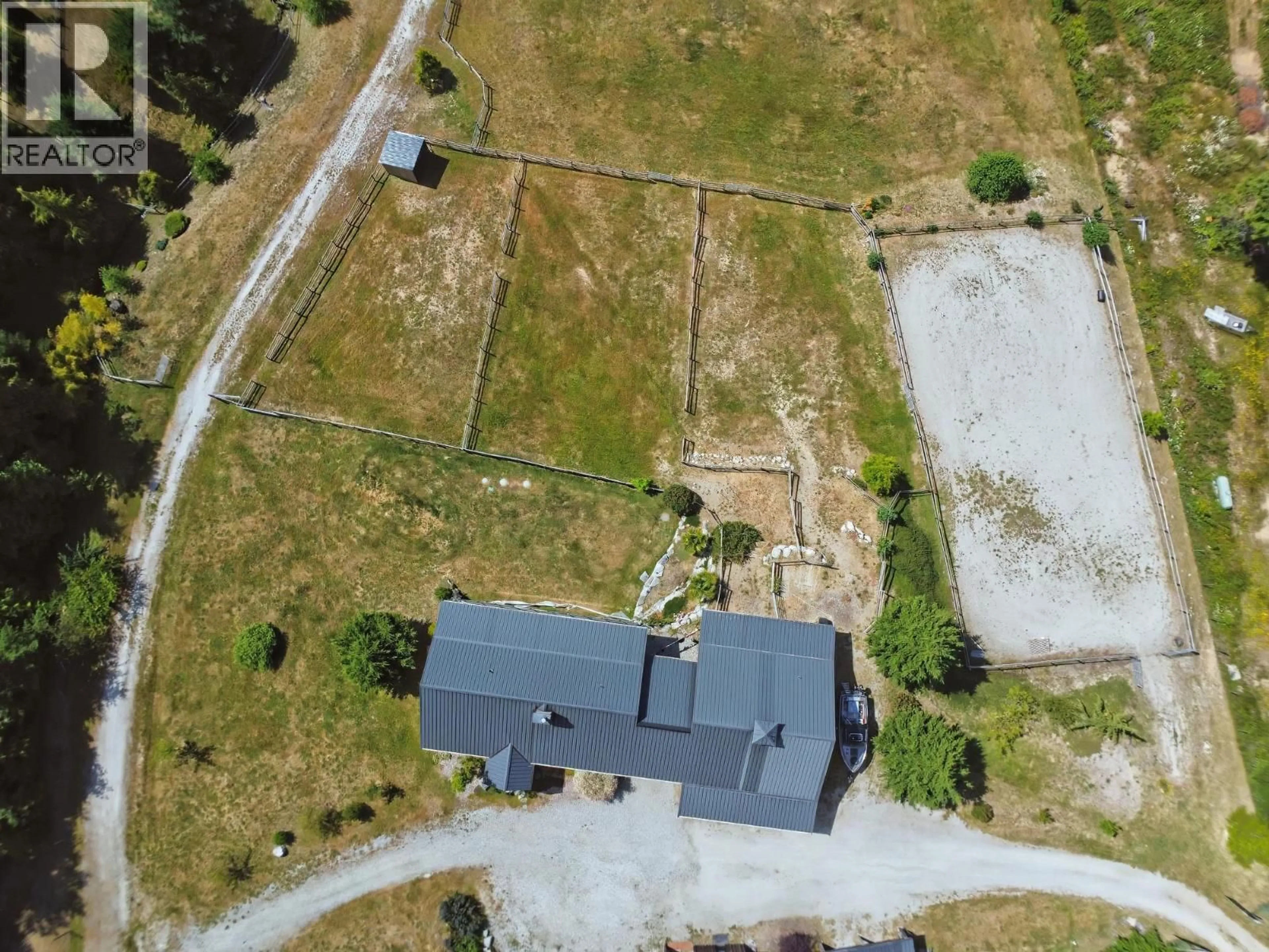 A pic from outside/outdoor area/front of a property/back of a property/a pic from drone, street for 2247 PIXTON ROAD, Roberts Creek British Columbia V0N2W5