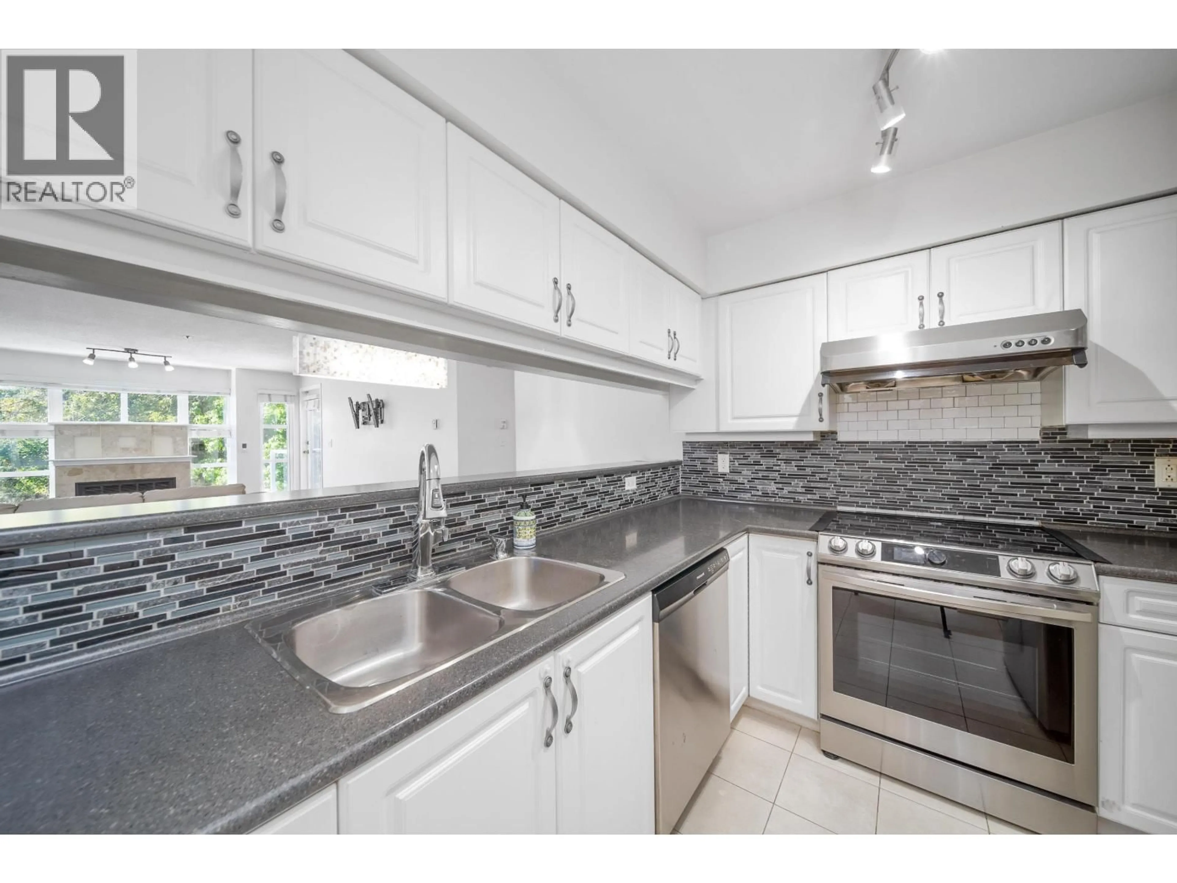 Standard kitchen, ceramic/tile floor for 302 - 8728 MARINE DRIVE, Vancouver British Columbia V6P6A4