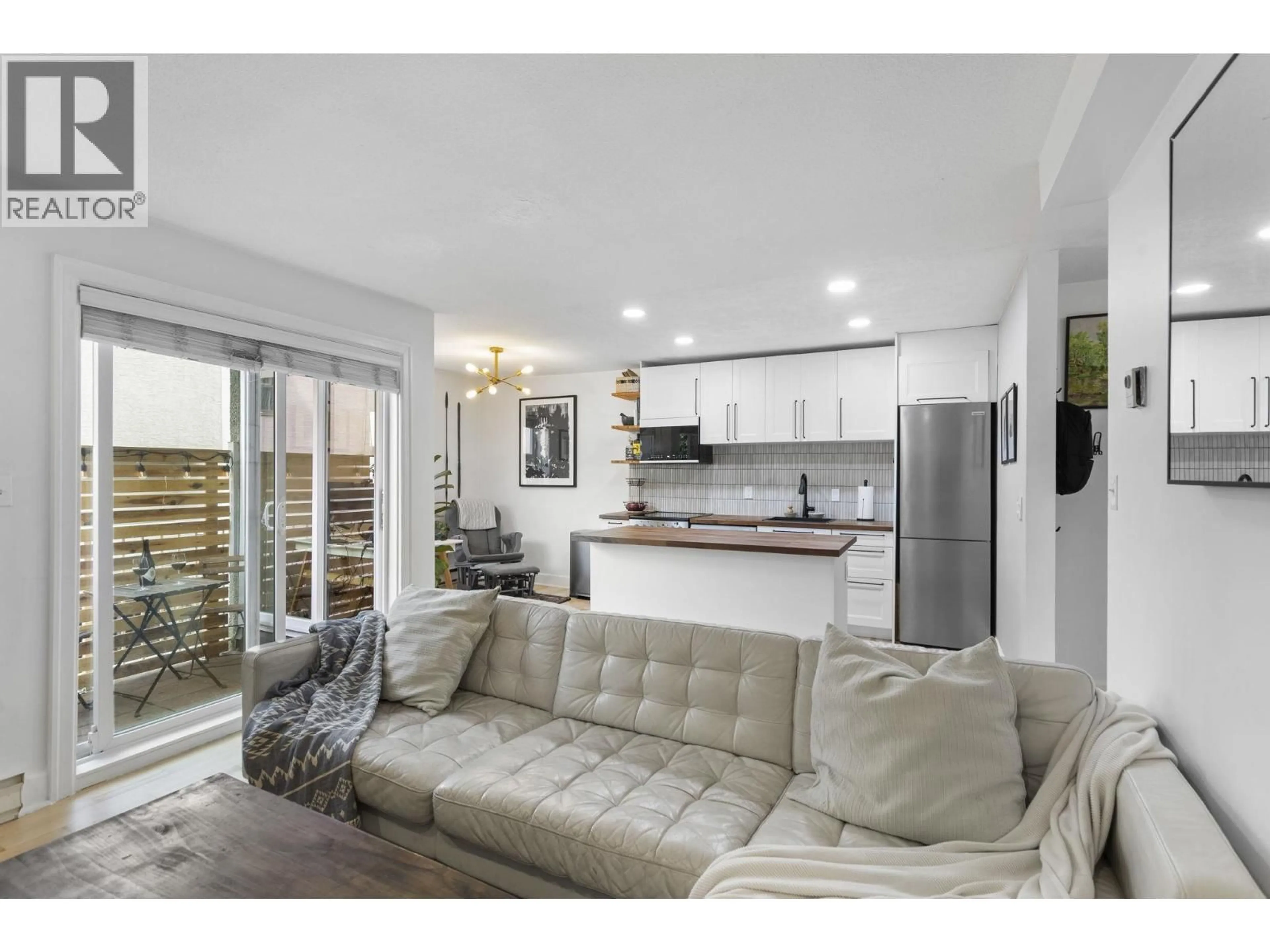 Open concept kitchen, wood/laminate floor for 104 - 1045 8TH AVENUE, Vancouver British Columbia V6H1C3