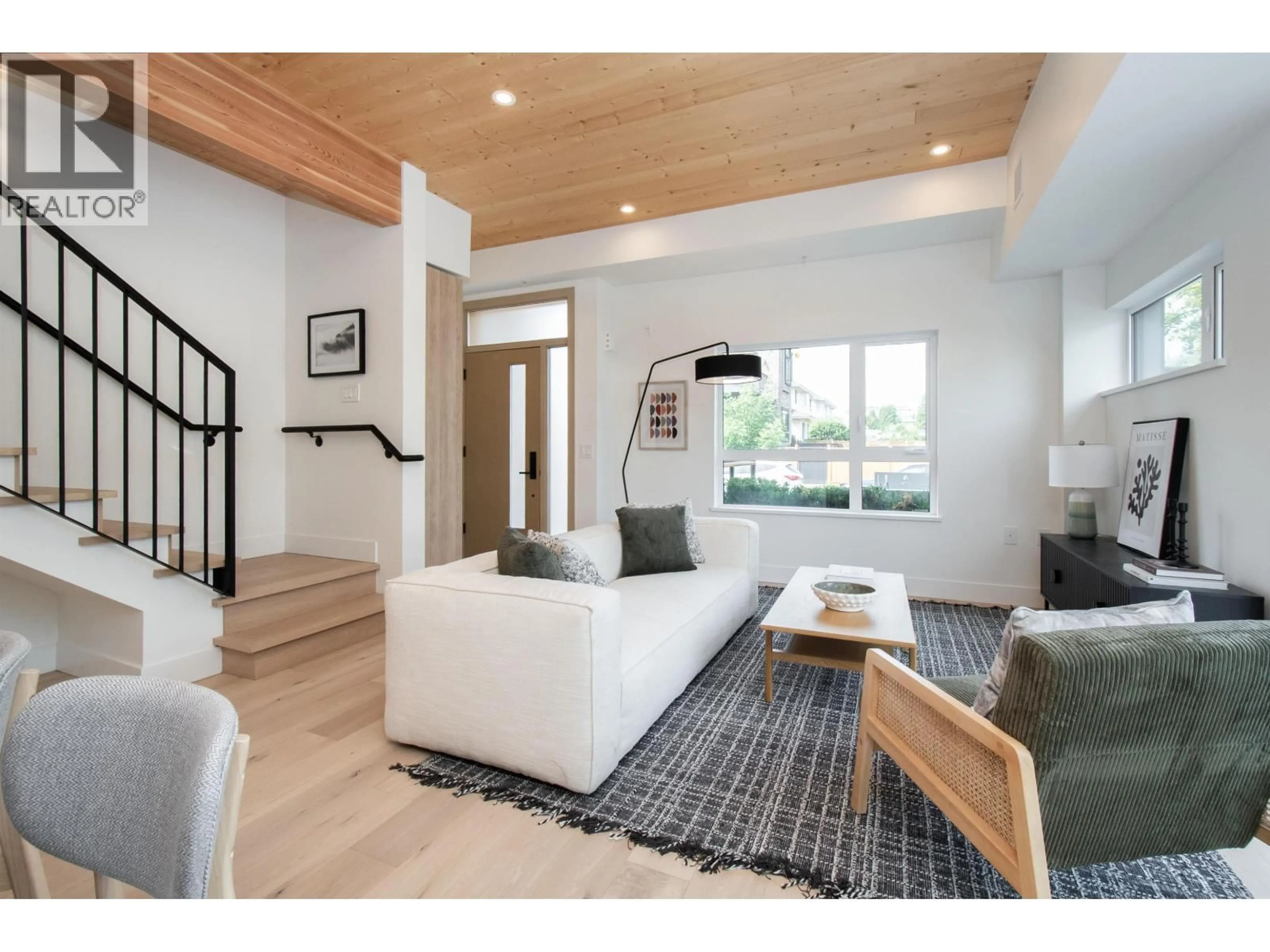 Living room with furniture, wood/laminate floor for 4150 COLUMBIA STREET, Vancouver British Columbia V5Y2J6