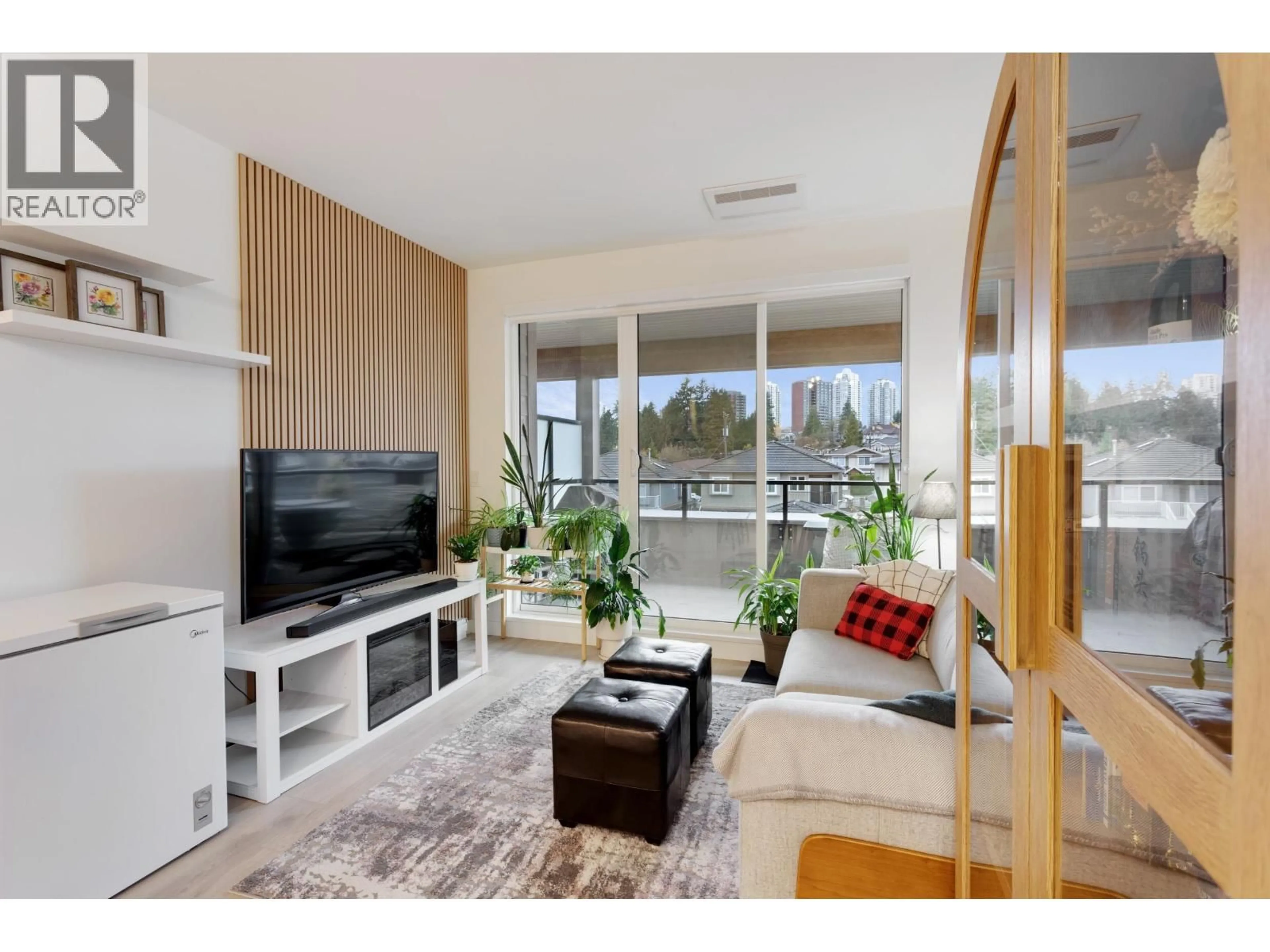 Living room with furniture, wood/laminate floor for 306 - 7588 16TH STREET, Burnaby British Columbia V3N0H8