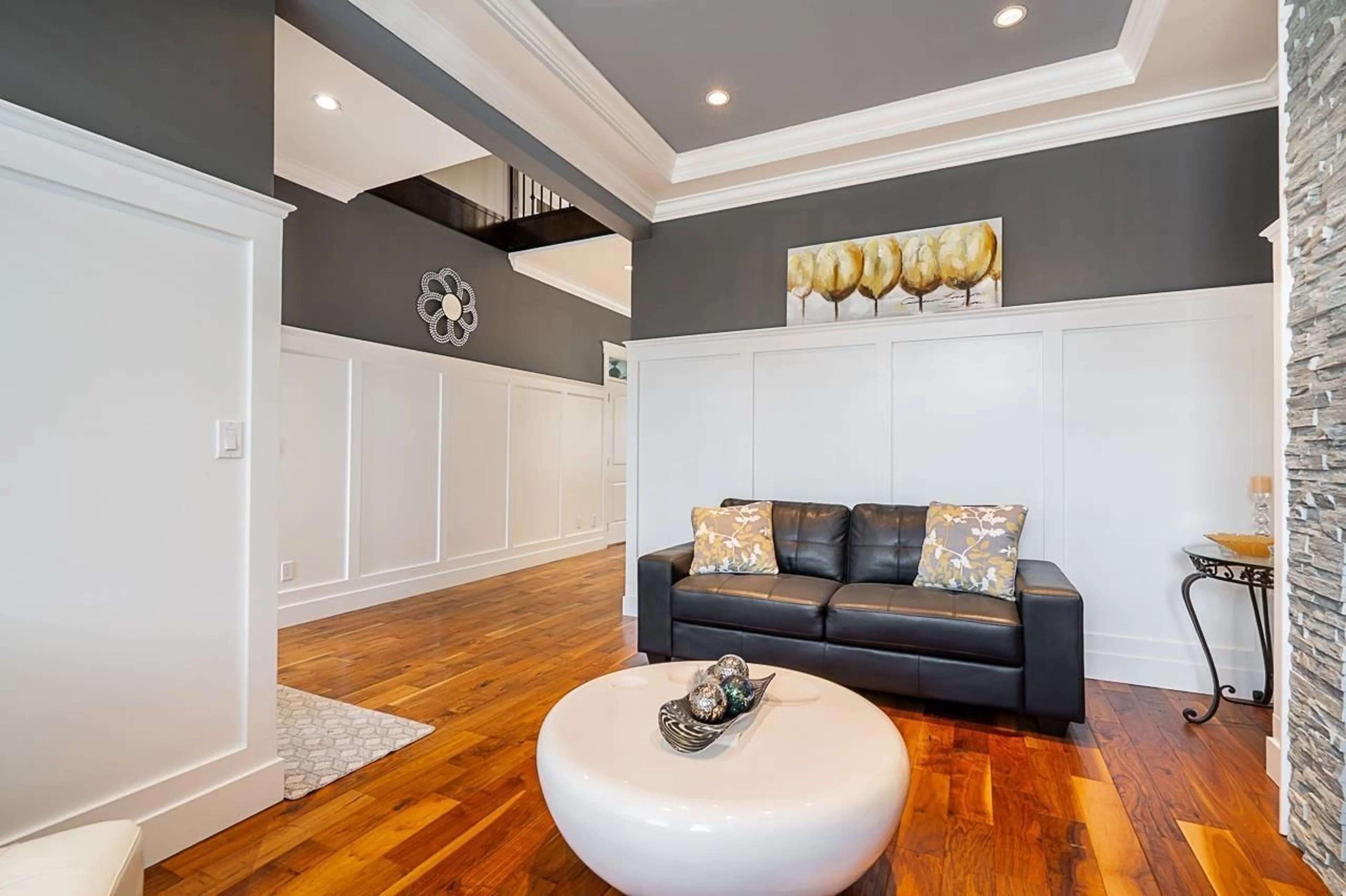 Living room with furniture, wood/laminate floor for 16302 25, Surrey British Columbia V3Z6S1