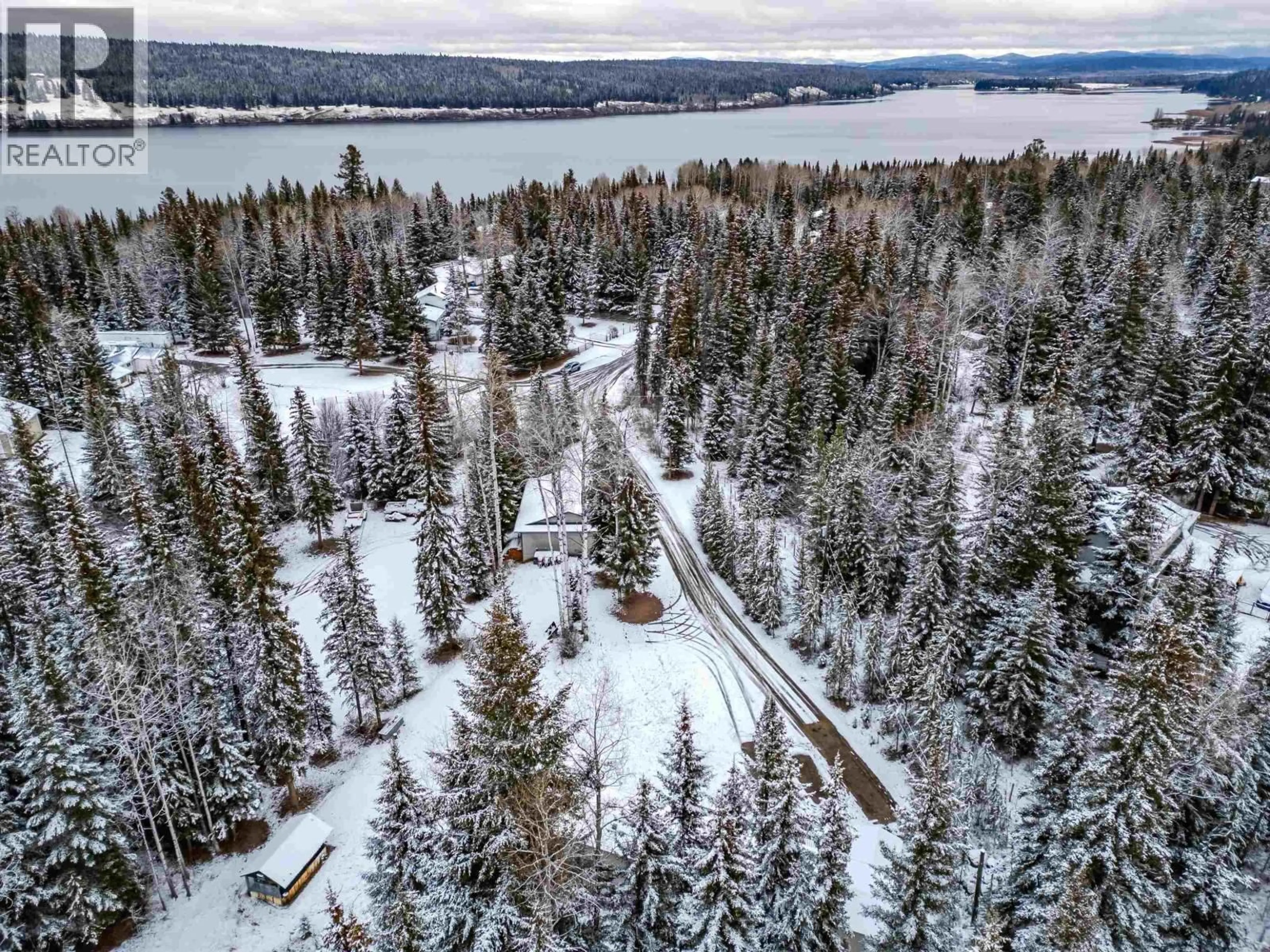 A pic from outside/outdoor area/front of a property/back of a property/a pic from drone, forest/trees view for 6324 WOLFE ROAD, 100 Mile House British Columbia V0K2E3