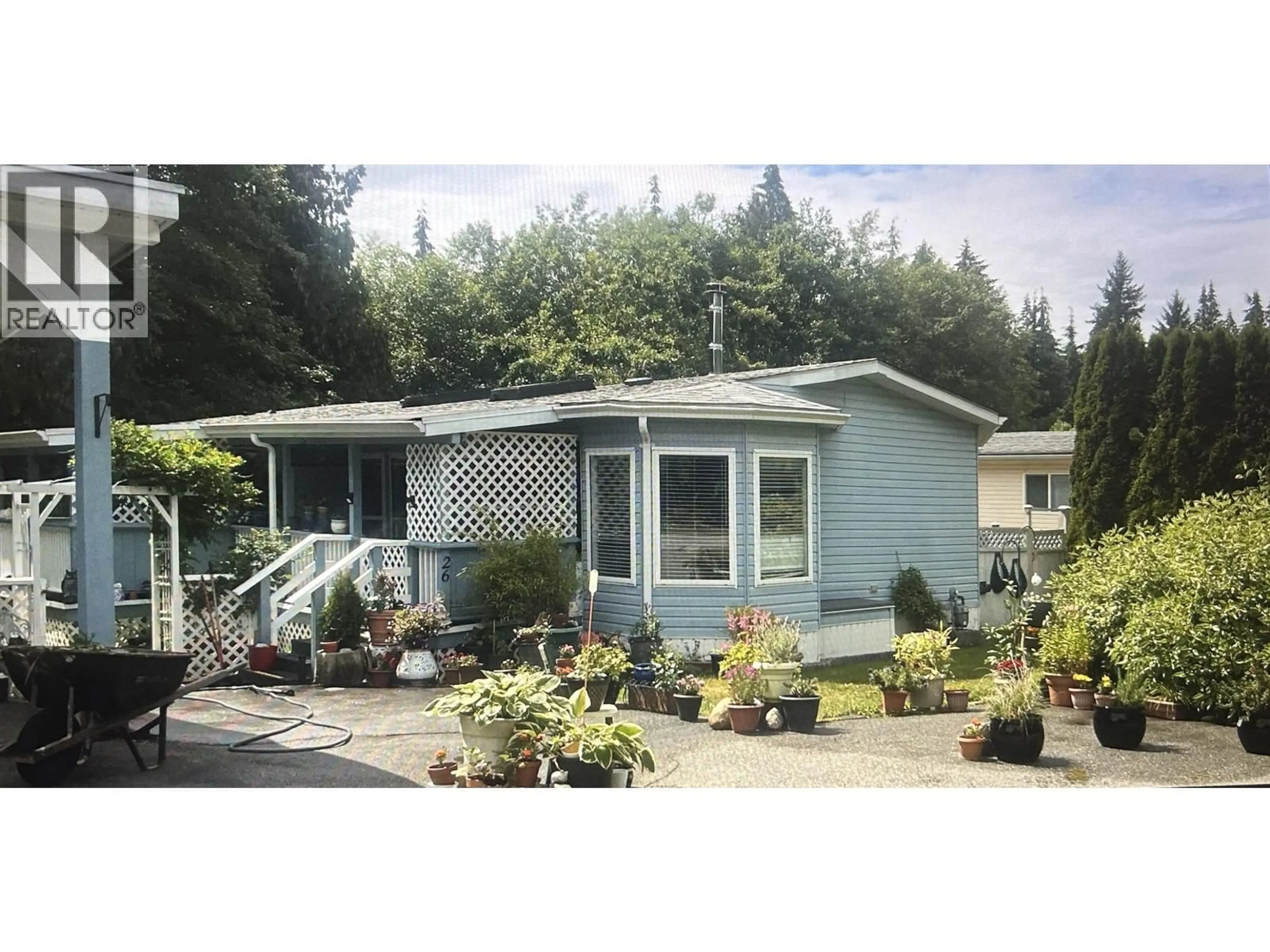 Home with vinyl exterior material, street for 26 - 1123 FLUME ROAD, Roberts Creek British Columbia V0N2W2