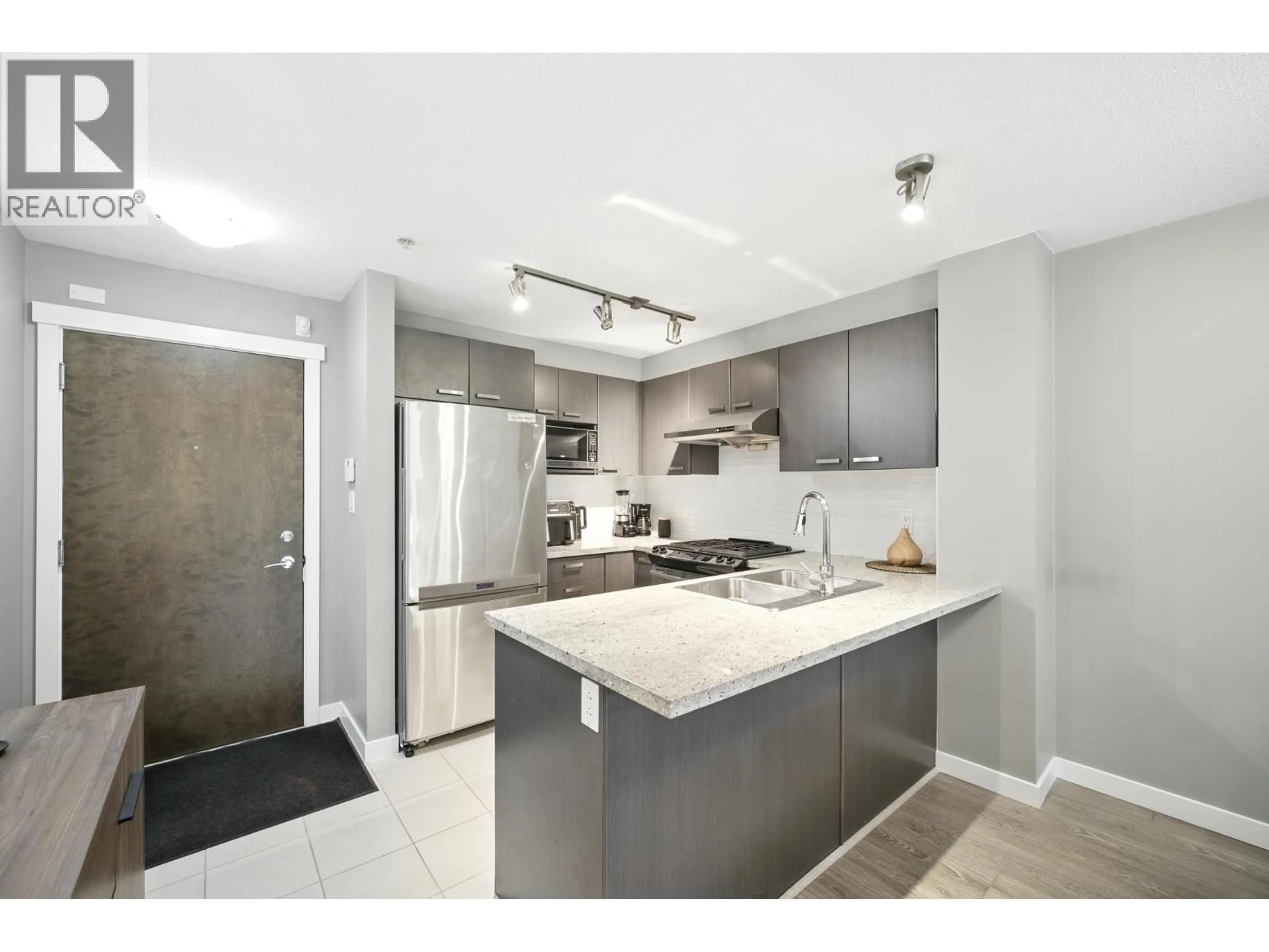Open concept kitchen, unknown for 118 - 9399 TOMICKI AVENUE, Richmond British Columbia V6X0H6