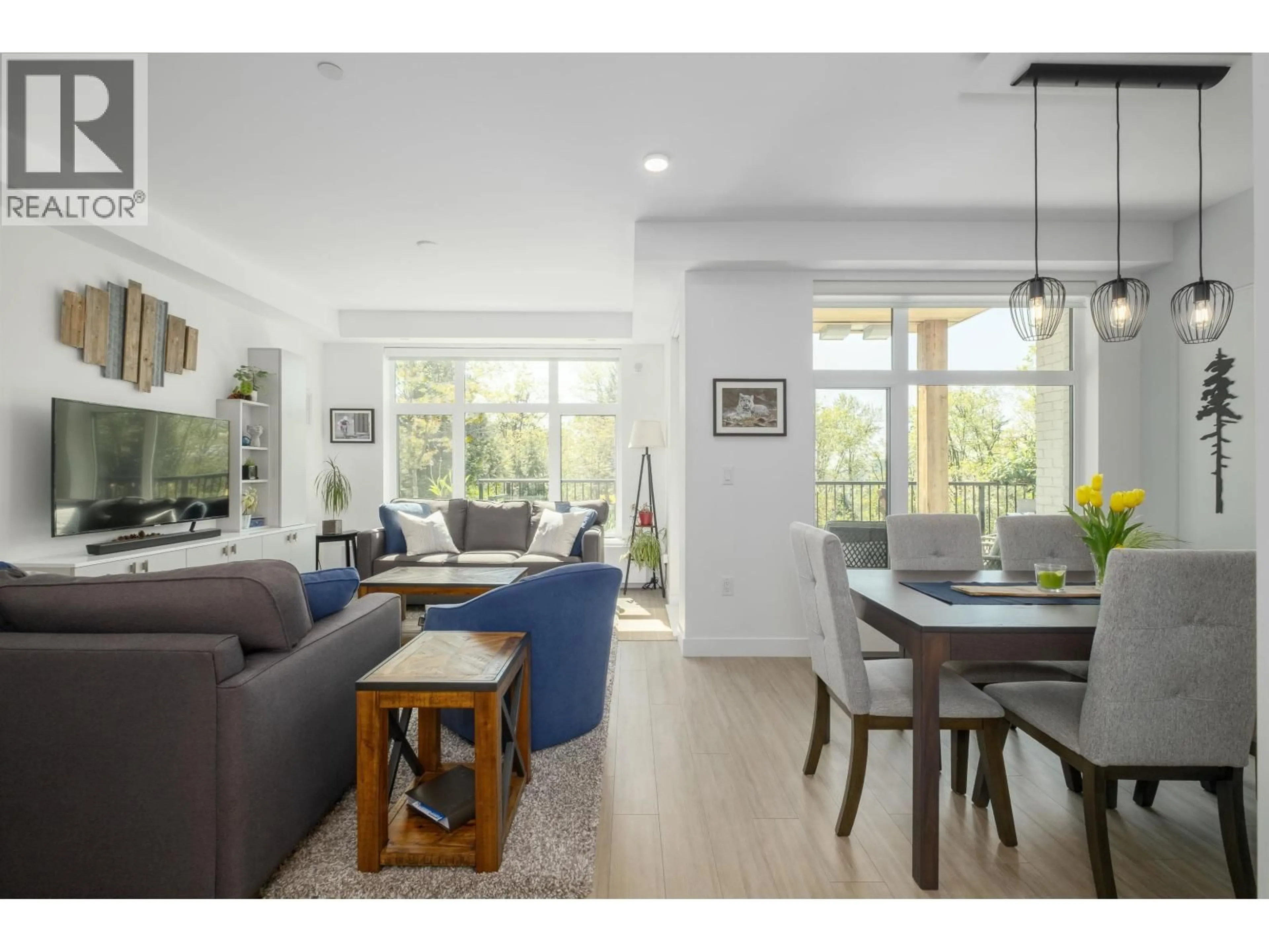 Living room with furniture, wood/laminate floor for 111 - 747 3RD STREET, North Vancouver British Columbia V7L1G8