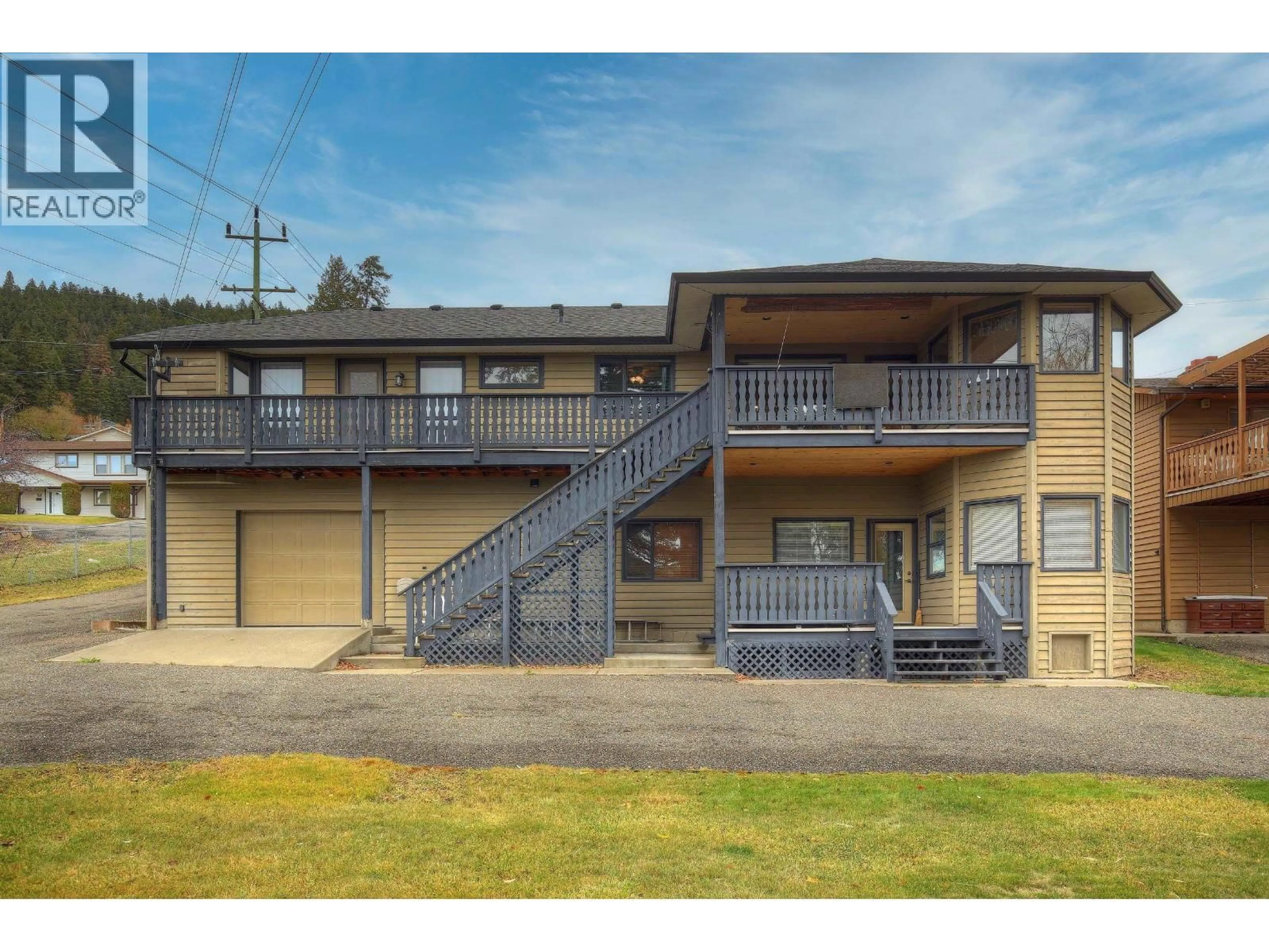 A pic from outside/outdoor area/front of a property/back of a property/a pic from drone, building for 599 PEARKES DRIVE, Williams Lake British Columbia V2G4B1