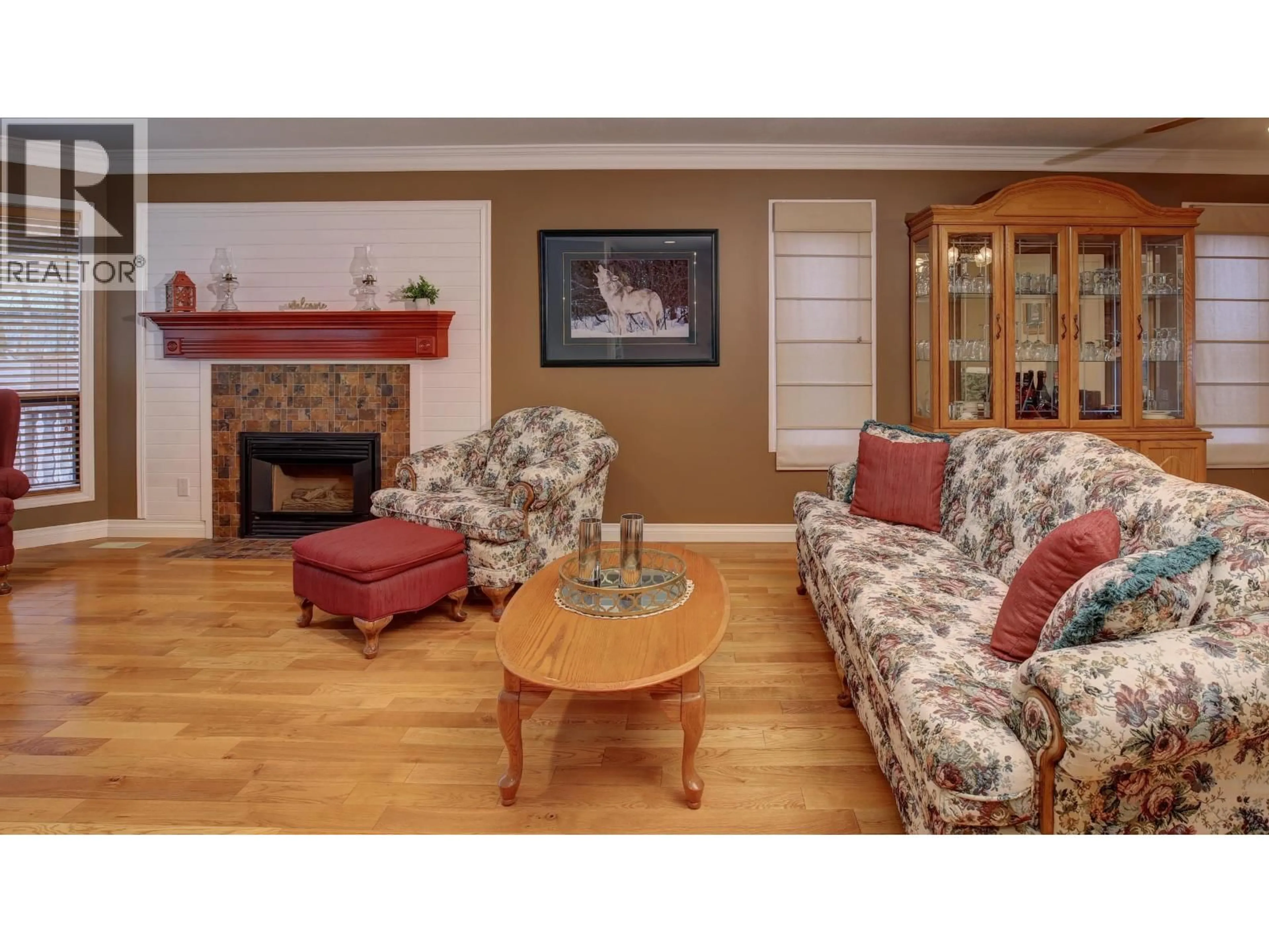 Living room with furniture, wood/laminate floor for 599 PEARKES DRIVE, Williams Lake British Columbia V2G4B1