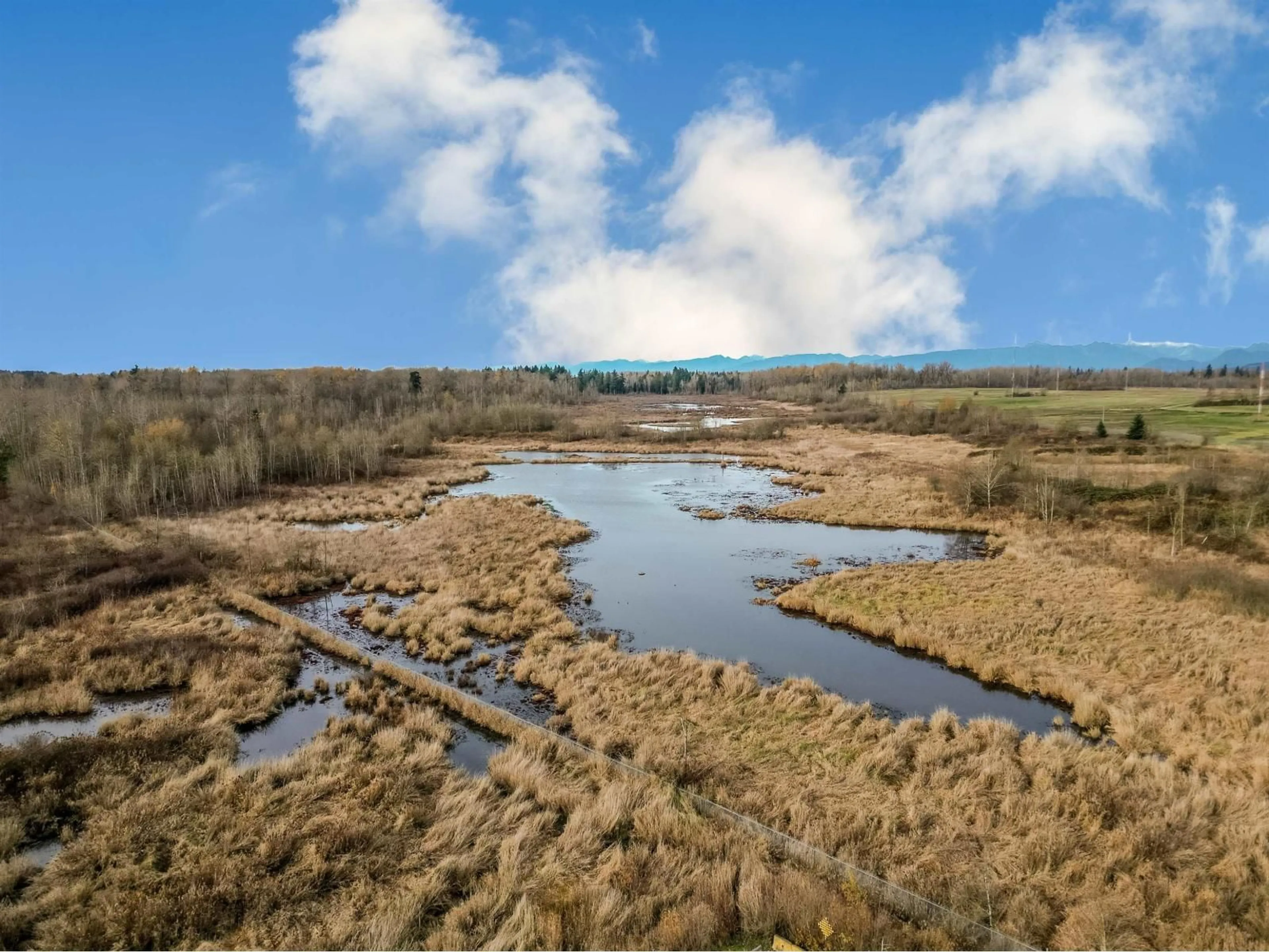 A pic from outside/outdoor area/front of a property/back of a property/a pic from drone, water/lake/river/ocean view for 27032 35B, Langley British Columbia V4W0C3