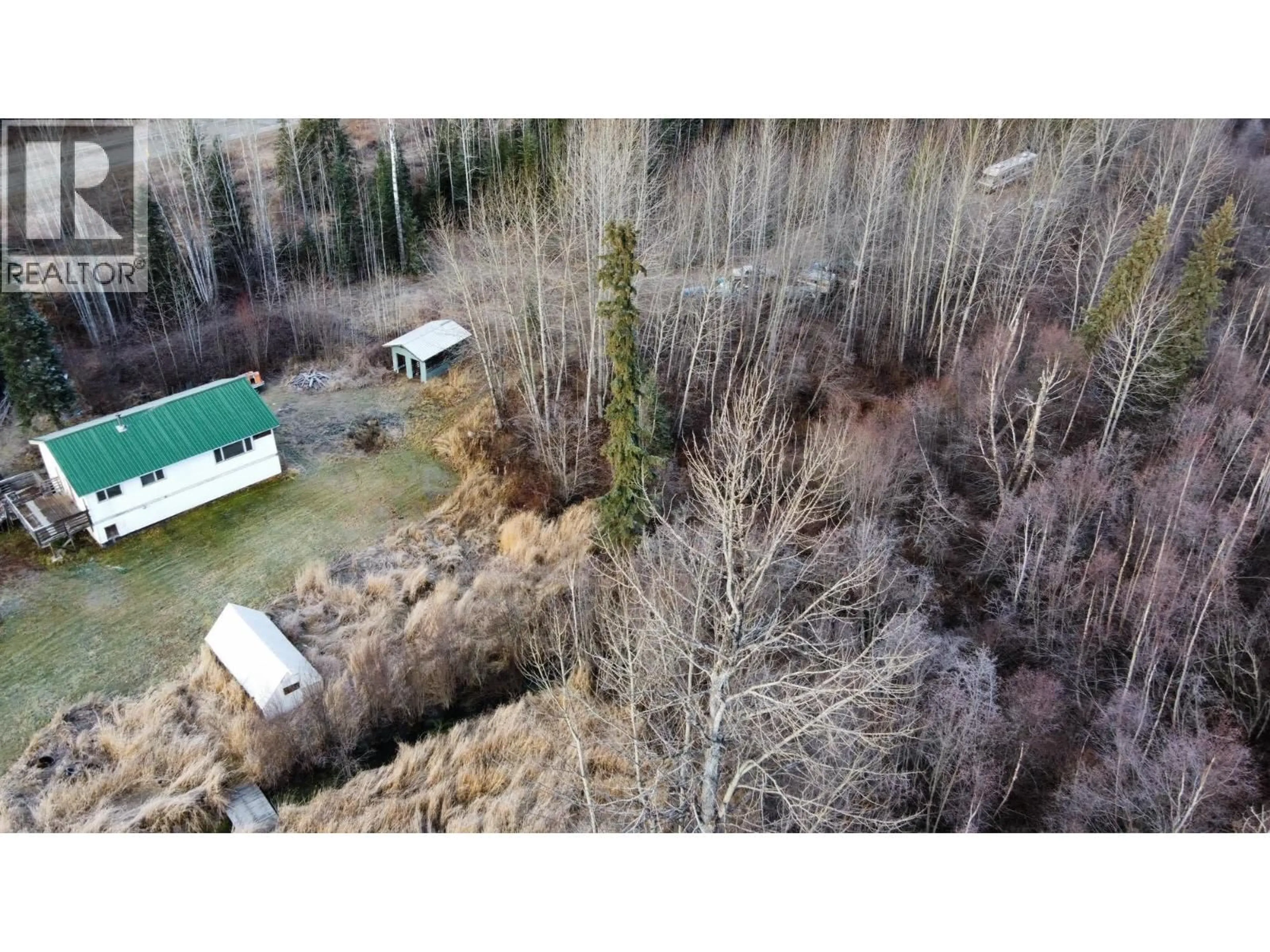 A pic from outside/outdoor area/front of a property/back of a property/a pic from drone, forest/trees view for 43378 97 HIGHWAY, Quesnel British Columbia V2J6X5