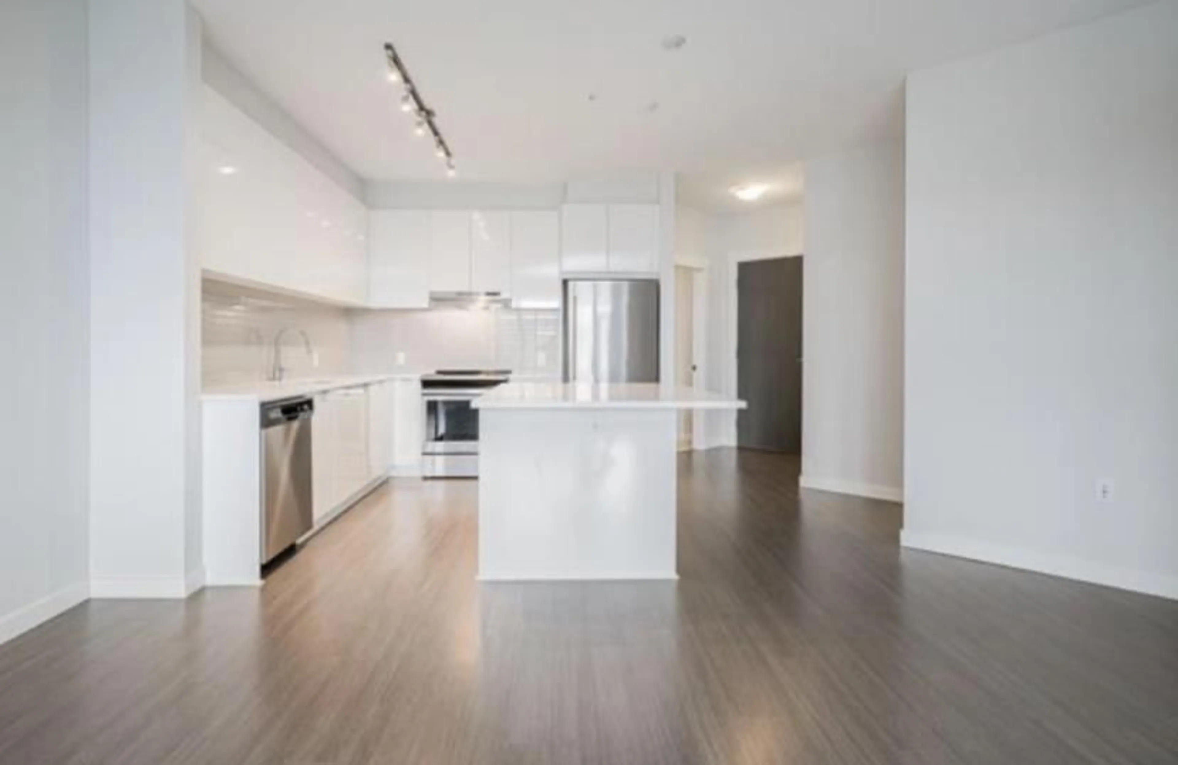 Open concept kitchen, wood/laminate floor for 403 - 31158 WESTRIDGE PLACE, Abbotsford British Columbia V2T0K5