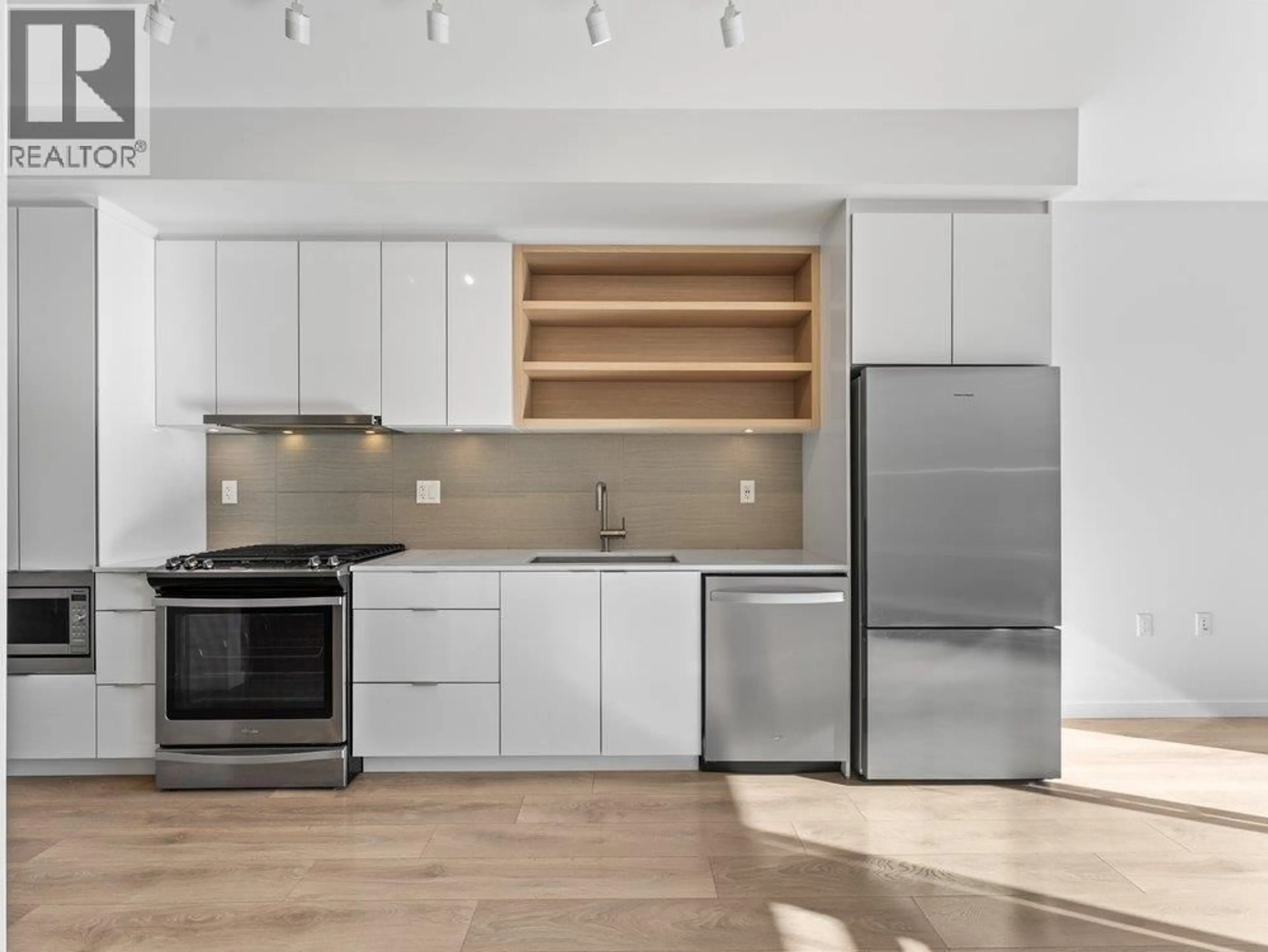 Open concept kitchen, unknown for 509 - 725 MARINE DRIVE, North Vancouver British Columbia V7M0G2