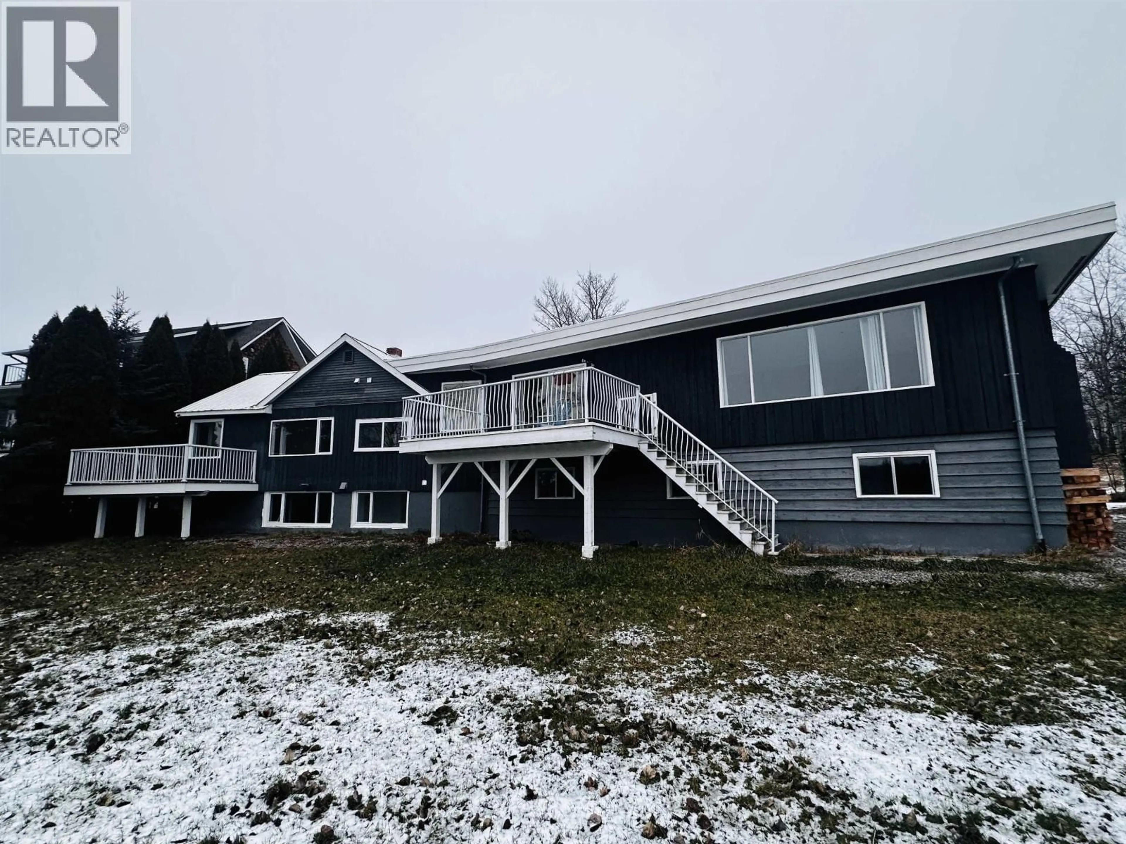 A pic from outside/outdoor area/front of a property/back of a property/a pic from drone, mountain view for 298 PIONEER WAY, Burns Lake British Columbia V0J1E0