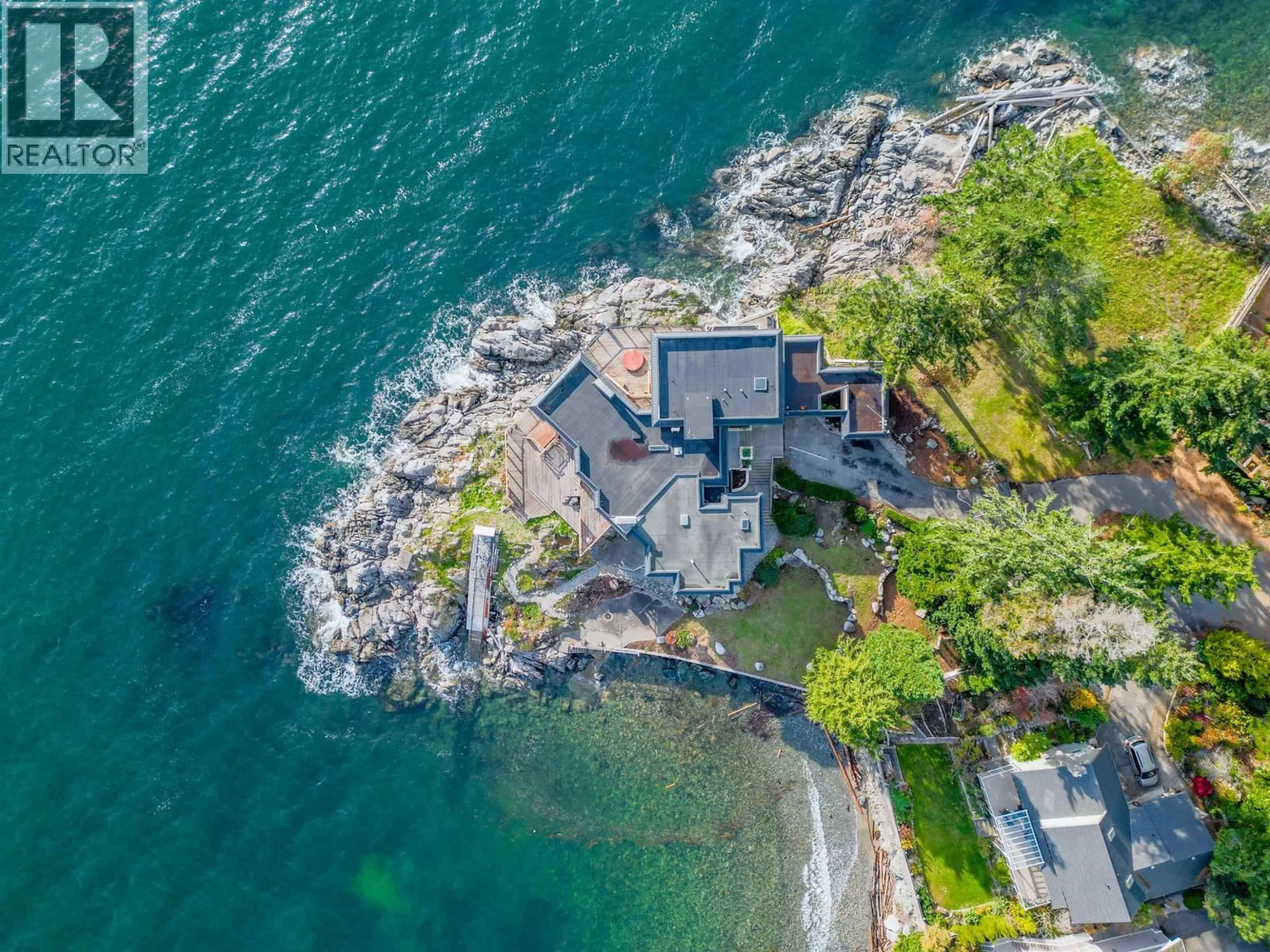 A pic from outside/outdoor area/front of a property/back of a property/a pic from drone, water/lake/river/ocean view for 5482 HILL ROAD, Sechelt British Columbia V7Z0N2