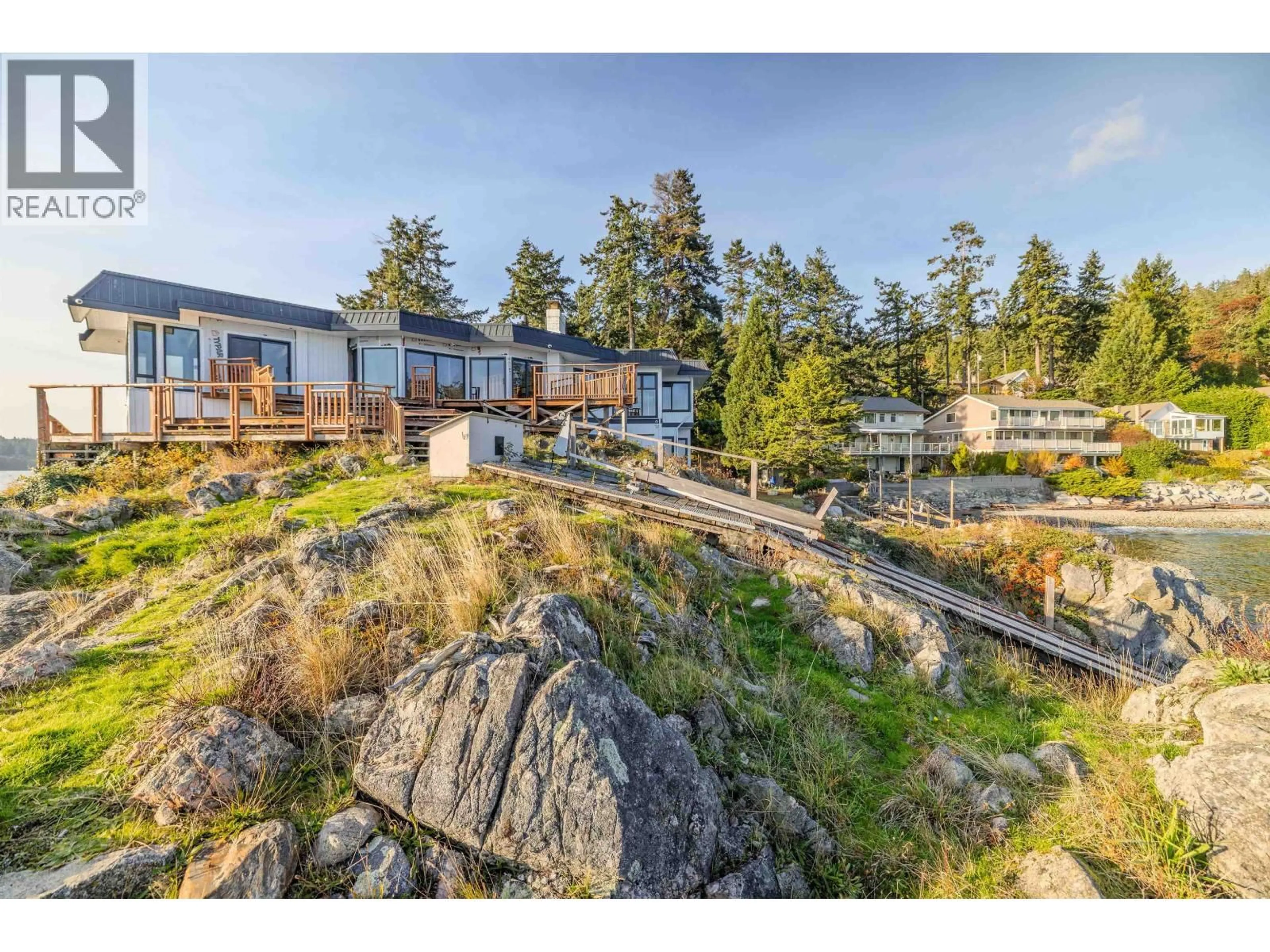 A pic from outside/outdoor area/front of a property/back of a property/a pic from drone, mountain view for 5482 HILL ROAD, Sechelt British Columbia V7Z0N2