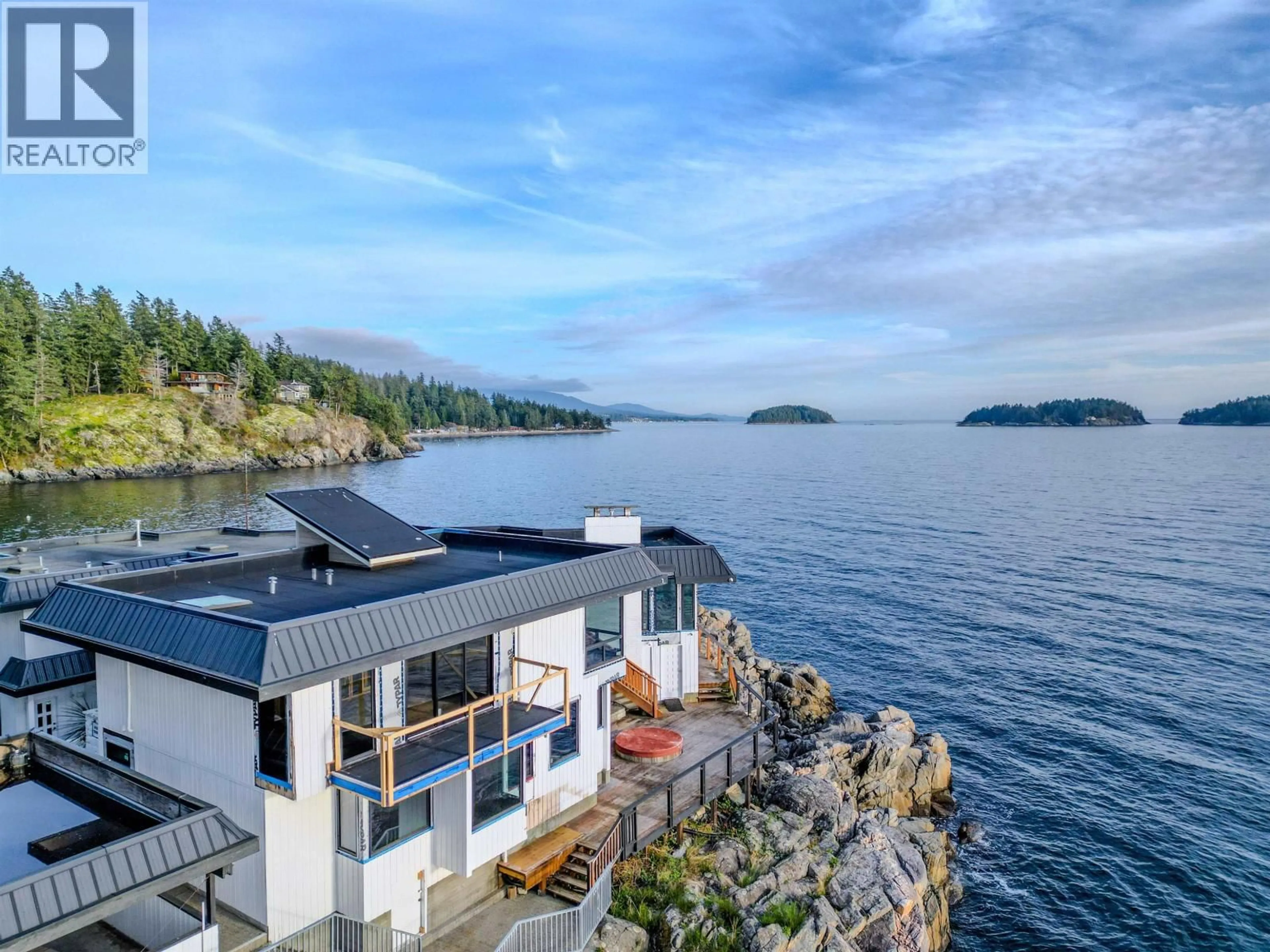 A pic from outside/outdoor area/front of a property/back of a property/a pic from drone, water/lake/river/ocean view for 5482 HILL ROAD, Sechelt British Columbia V7Z0N2