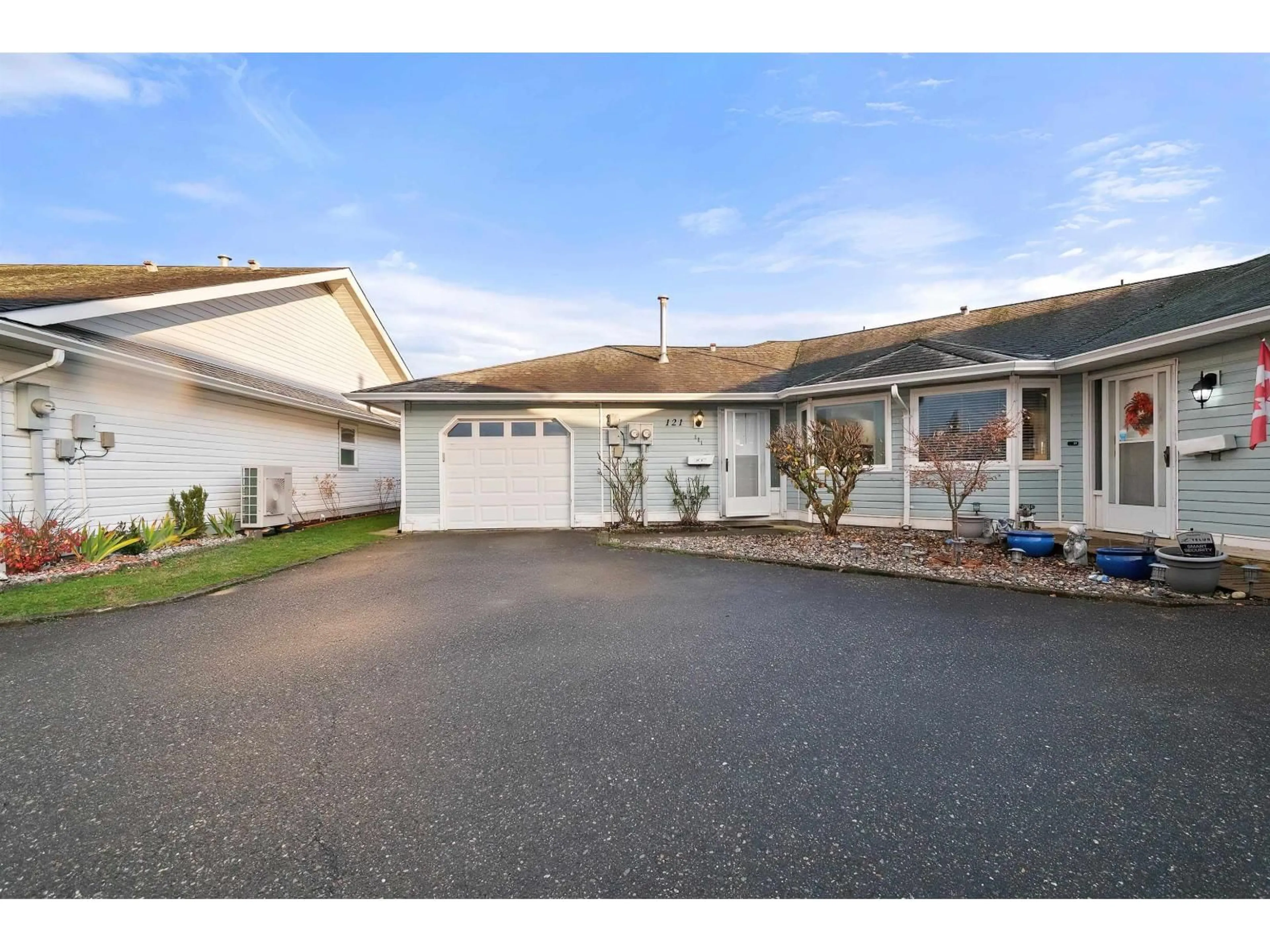 A pic from outside/outdoor area/front of a property/back of a property/a pic from drone, street for 121 - 7610 EVANS, ROAD, Chilliwack British Columbia V2R2X9