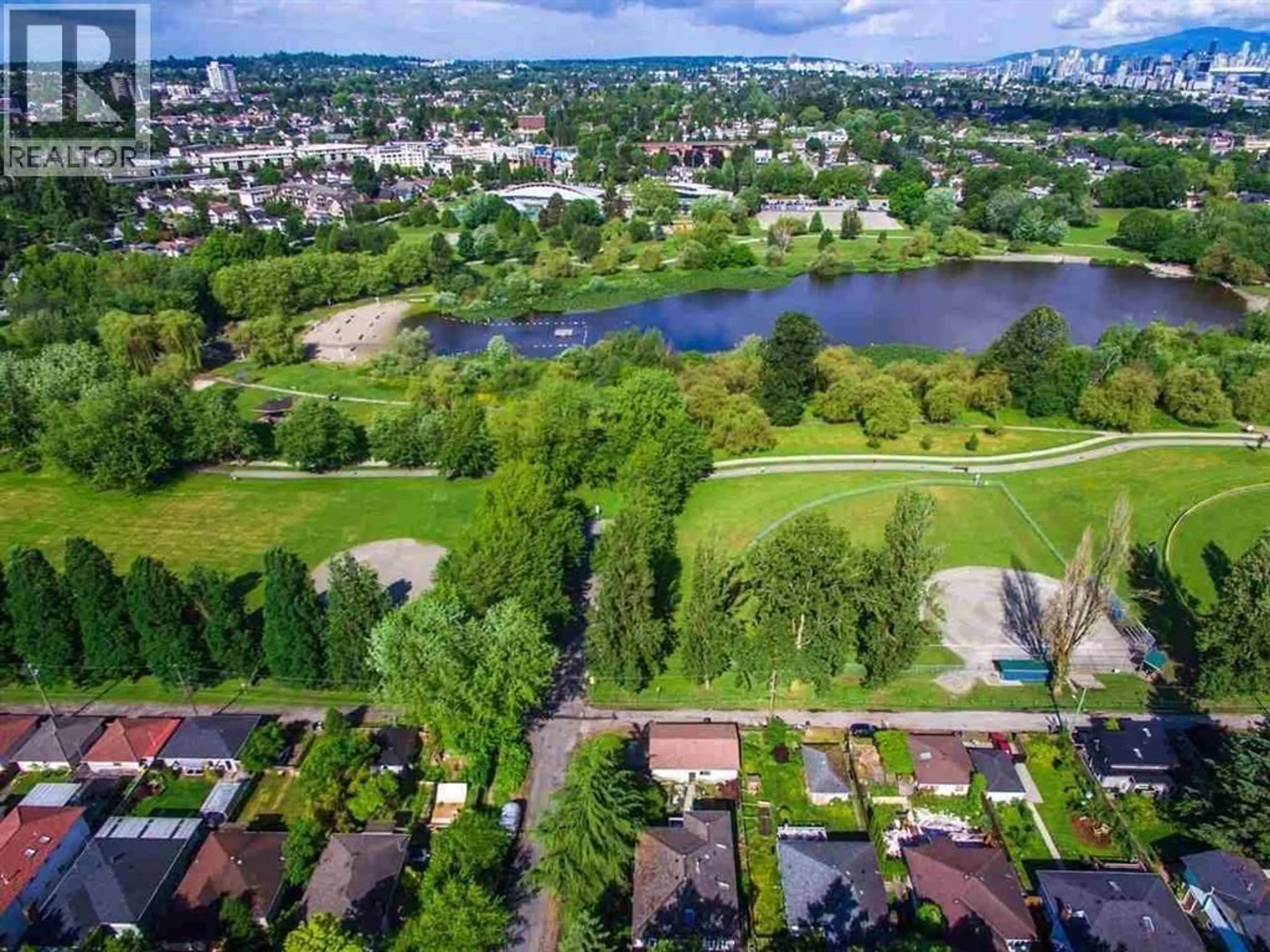 A pic from outside/outdoor area/front of a property/back of a property/a pic from drone, water/lake/river/ocean view for 3290 GARDEN DRIVE, Vancouver British Columbia V5N4Y1