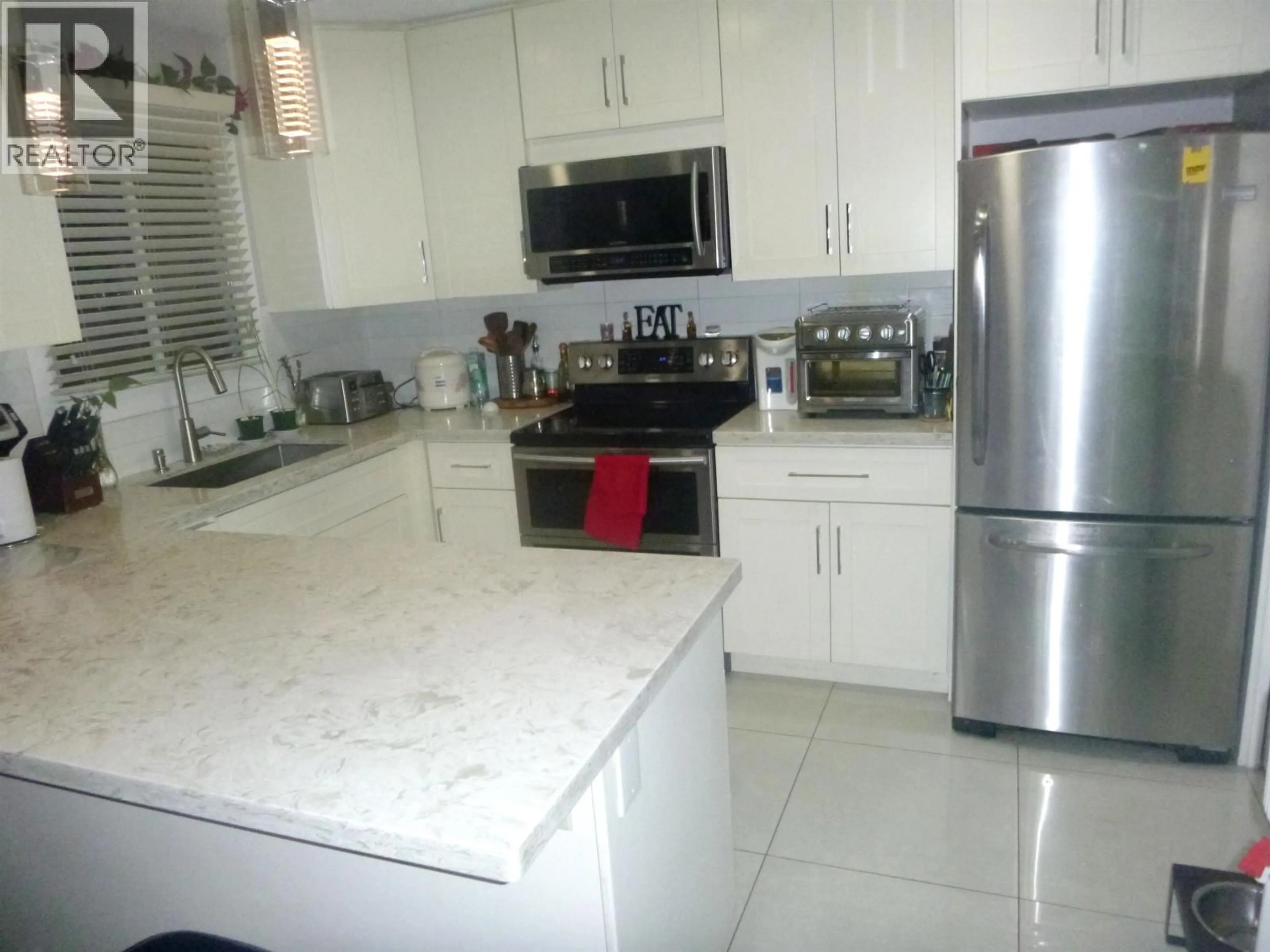 Open concept kitchen, ceramic/tile floor for 11171 STEVESTON HIGHWAY, Richmond British Columbia V7A1N7