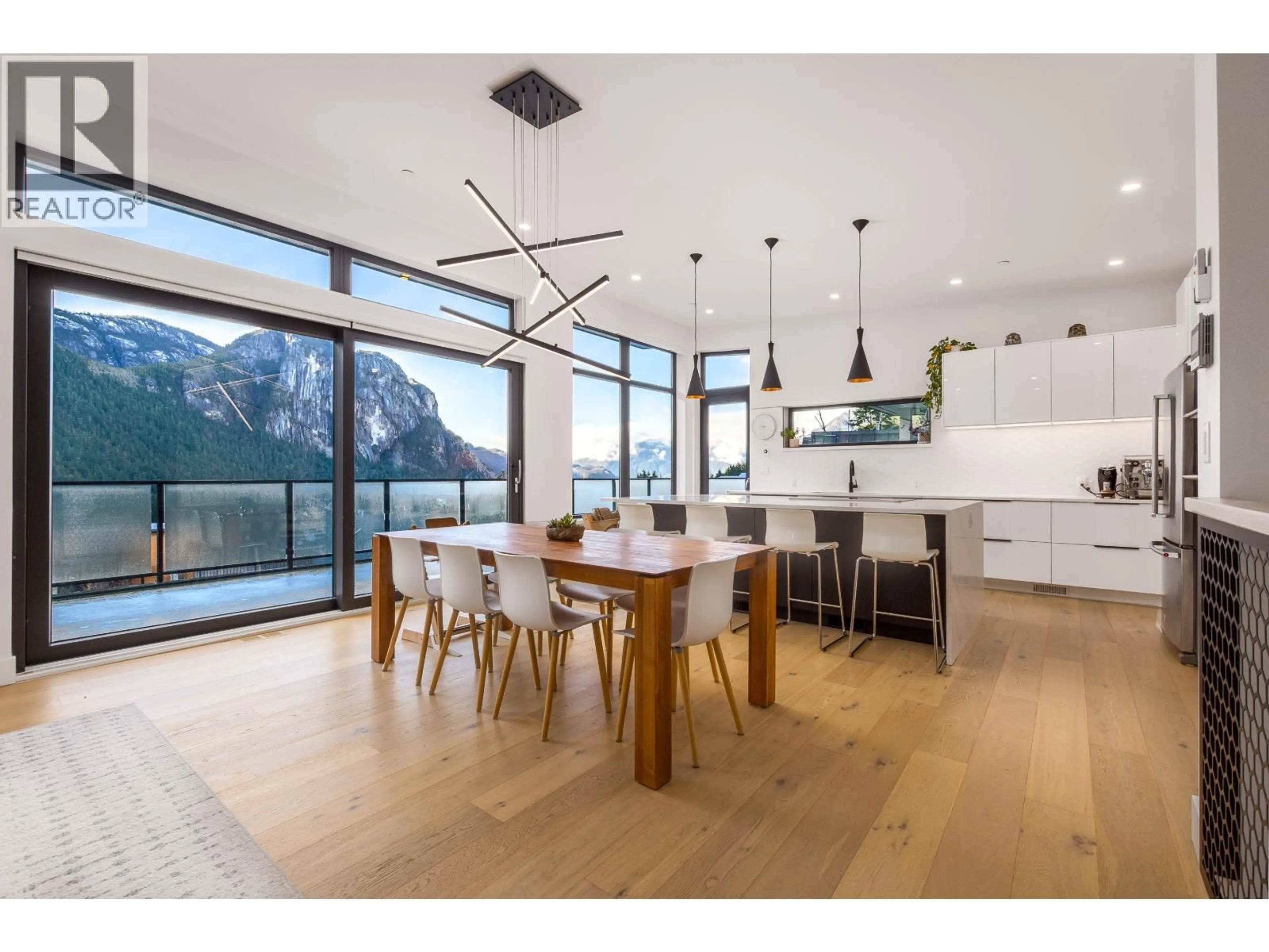 Open concept kitchen, wood/laminate floor for 2193 CRUMPIT WOODS DRIVE, Squamish British Columbia V8B0T6