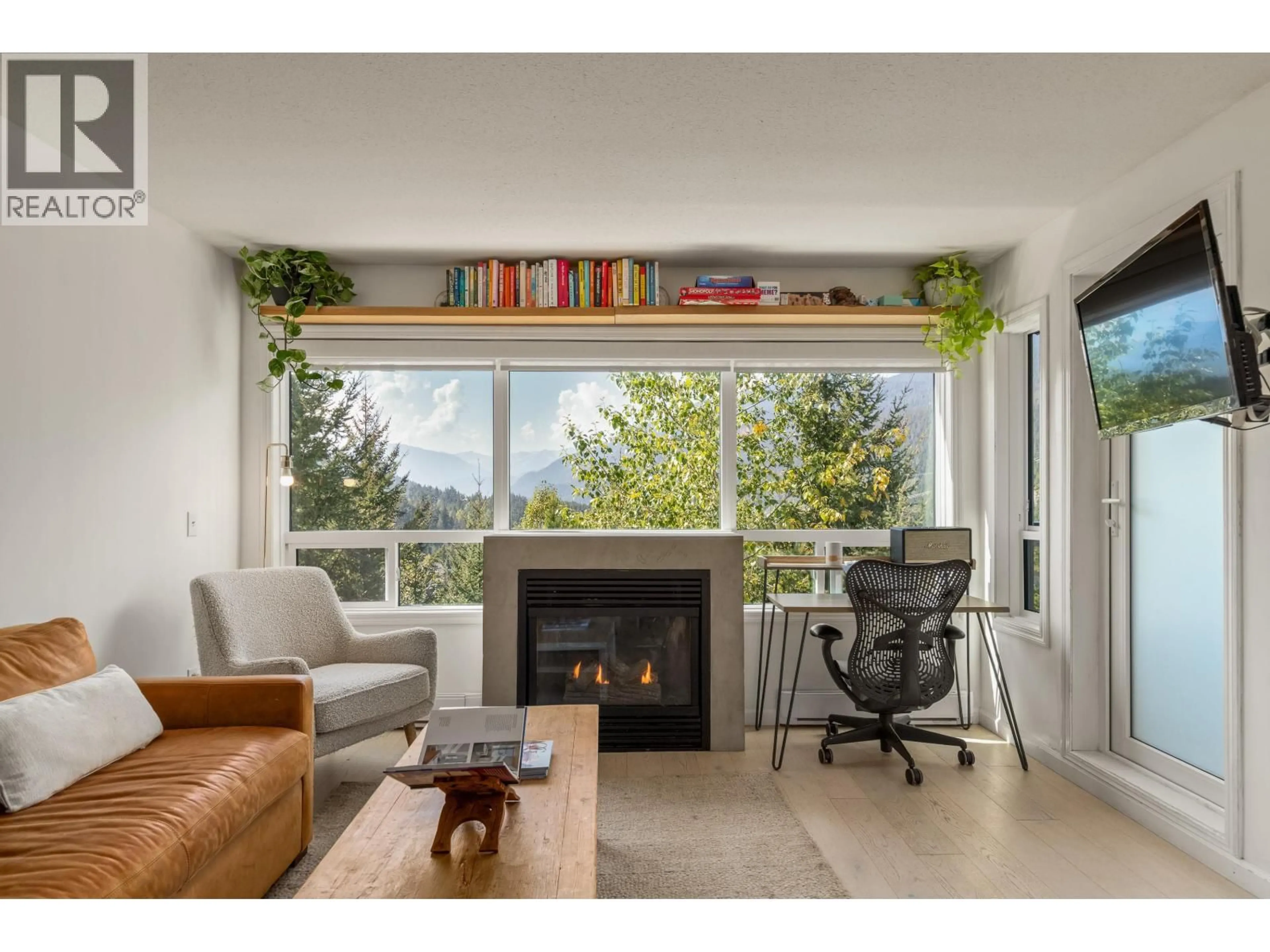 Living room with furniture, unknown for 310 - 2221 GONDOLA WAY, Whistler British Columbia V8E0M8