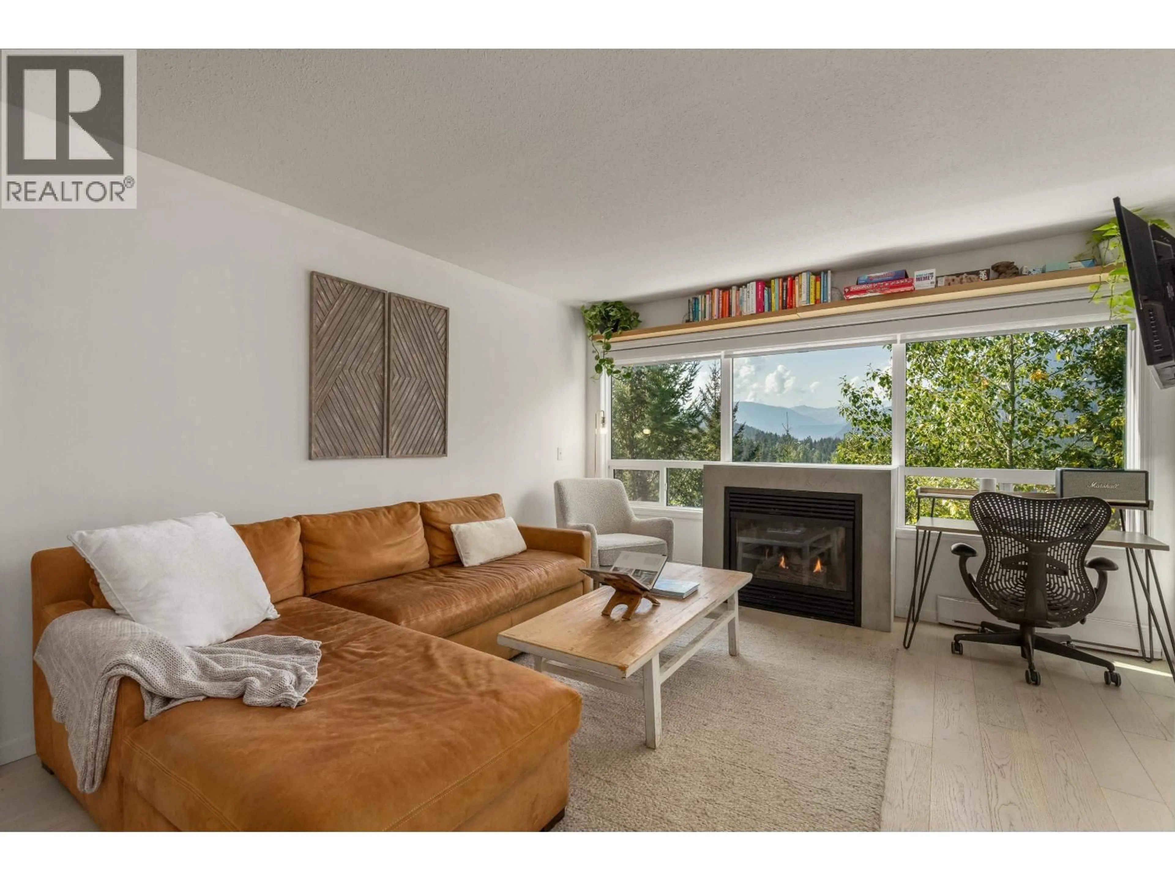 Living room with furniture, unknown for 310 - 2221 GONDOLA WAY, Whistler British Columbia V8E0M8