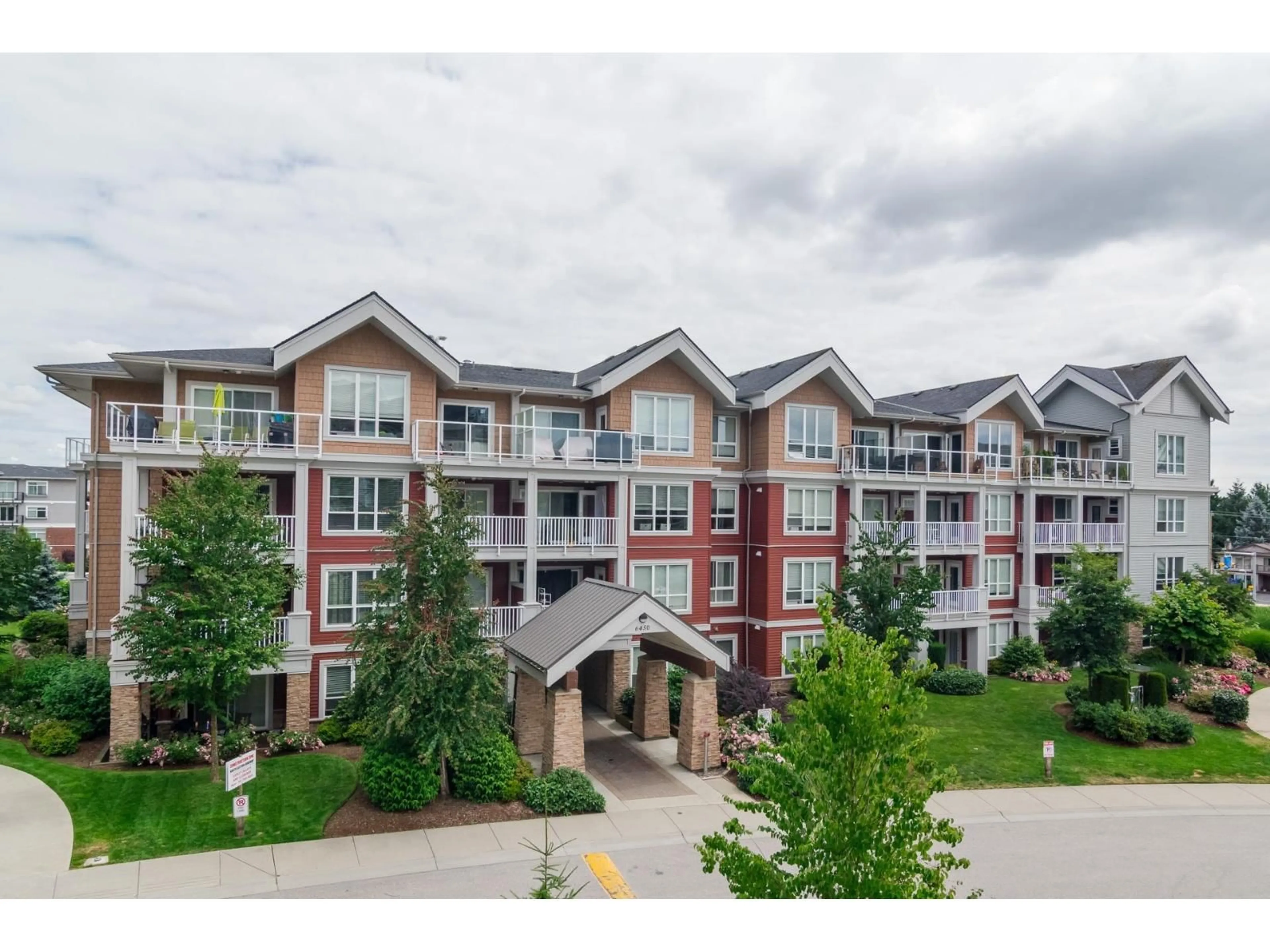 A pic from outside/outdoor area/front of a property/back of a property/a pic from drone, mountain view for 307 - 6450 194 STREET, Surrey British Columbia V4N6J8