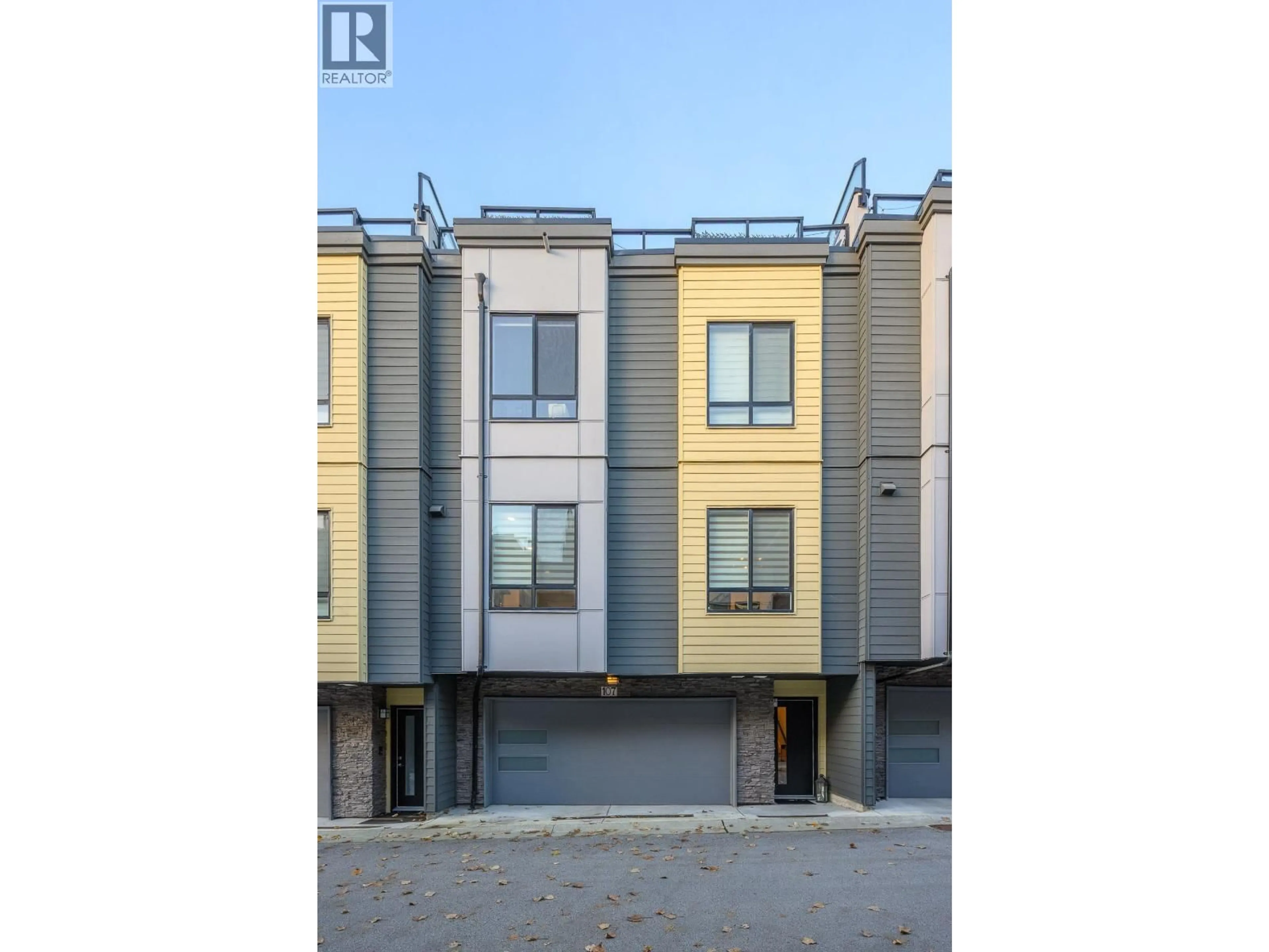 A pic from outside/outdoor area/front of a property/back of a property/a pic from drone, street for 107 - 3503 GISLASON AVENUE, Coquitlam British Columbia V3E0T1