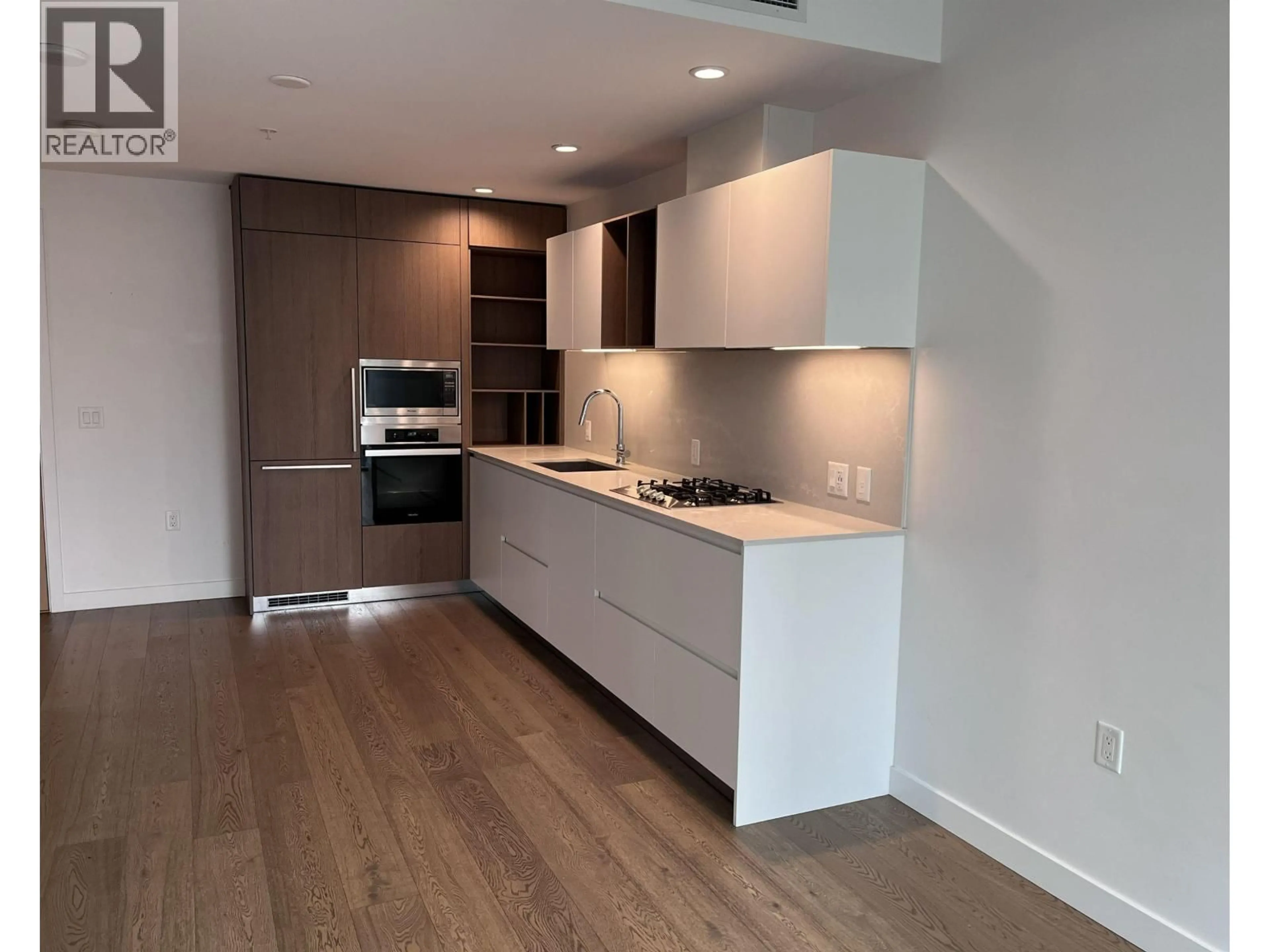 Open concept kitchen, wood/laminate floor for 3003 - 6000 MCKAY AVENUE, Burnaby British Columbia V5H0K2