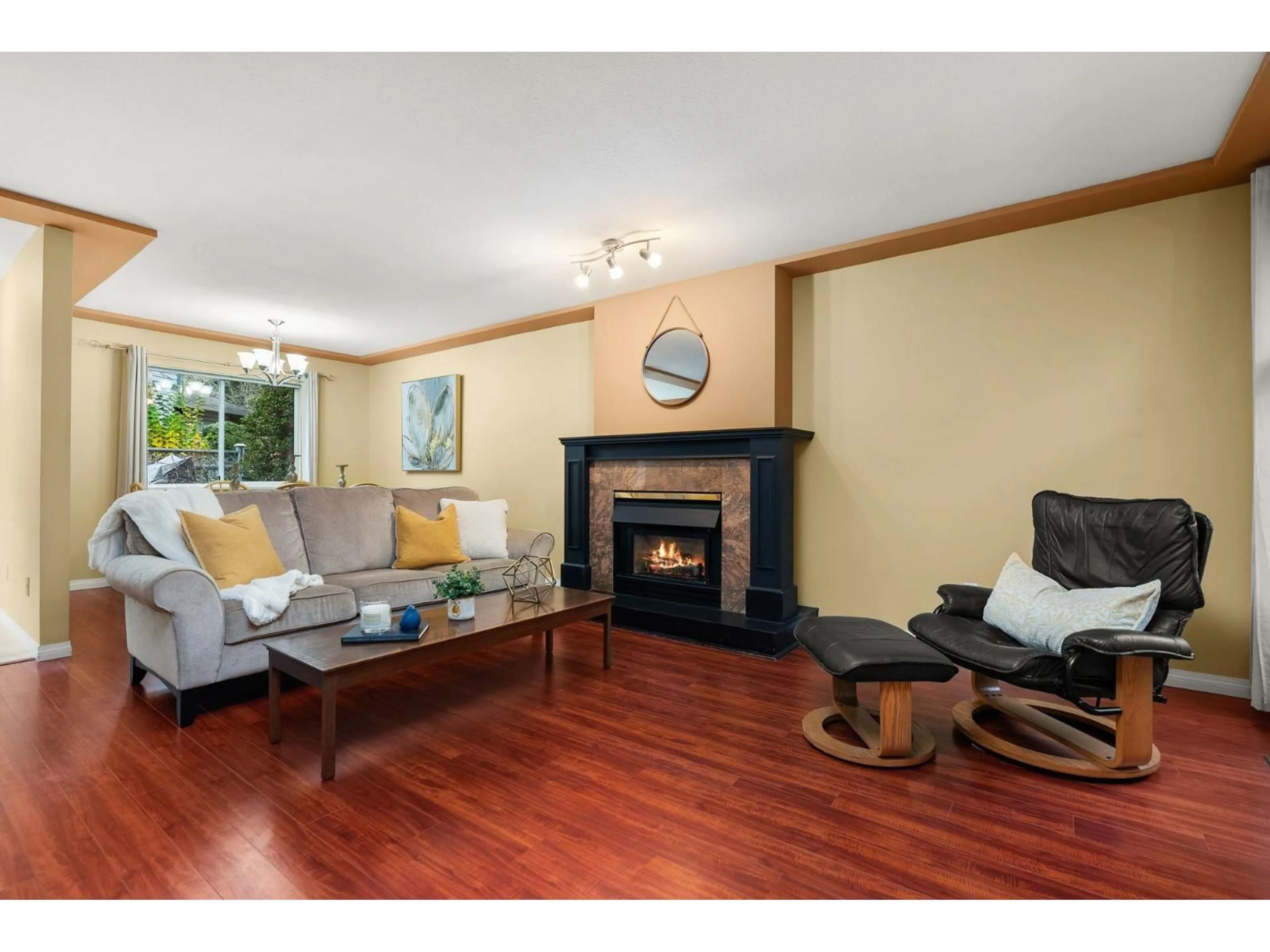 Living room with furniture, wood/laminate floor for 121 - 12044 BOUNDARY DRIVE, Surrey British Columbia V3X2B4