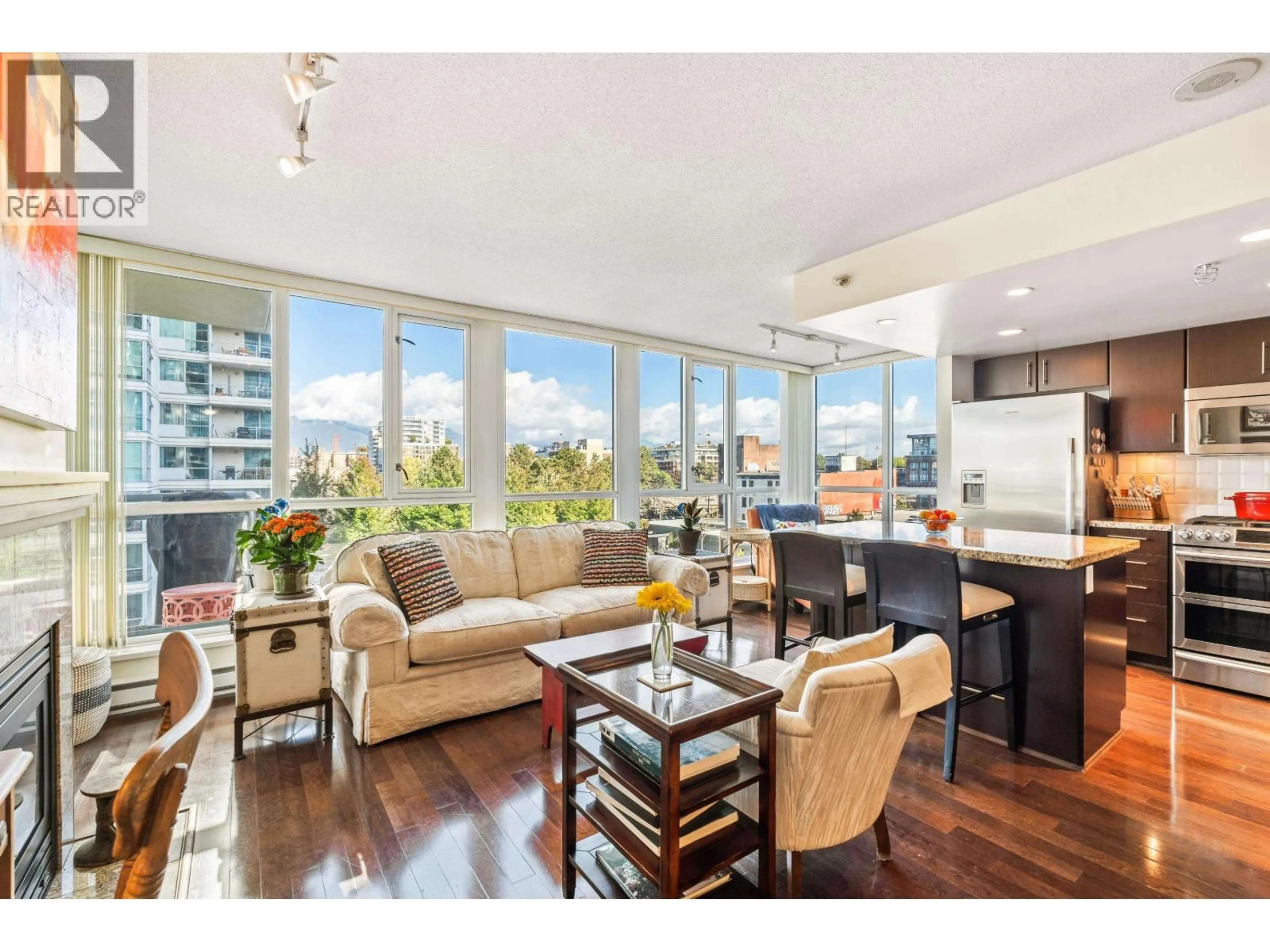 Living room with furniture, wood/laminate floor for 701 - 120 MILROSS AVENUE, Vancouver British Columbia V6A4K7