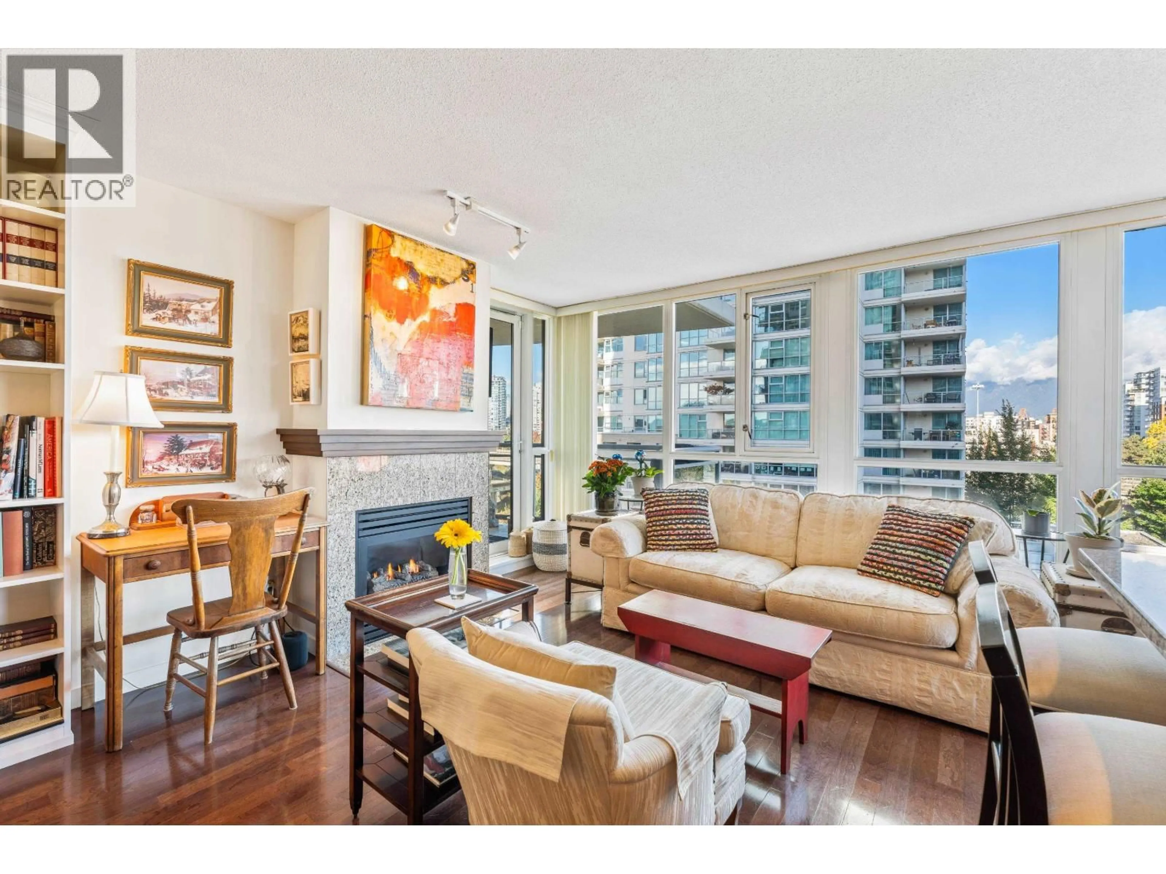 Living room with furniture, wood/laminate floor for 701 - 120 MILROSS AVENUE, Vancouver British Columbia V6A4K7