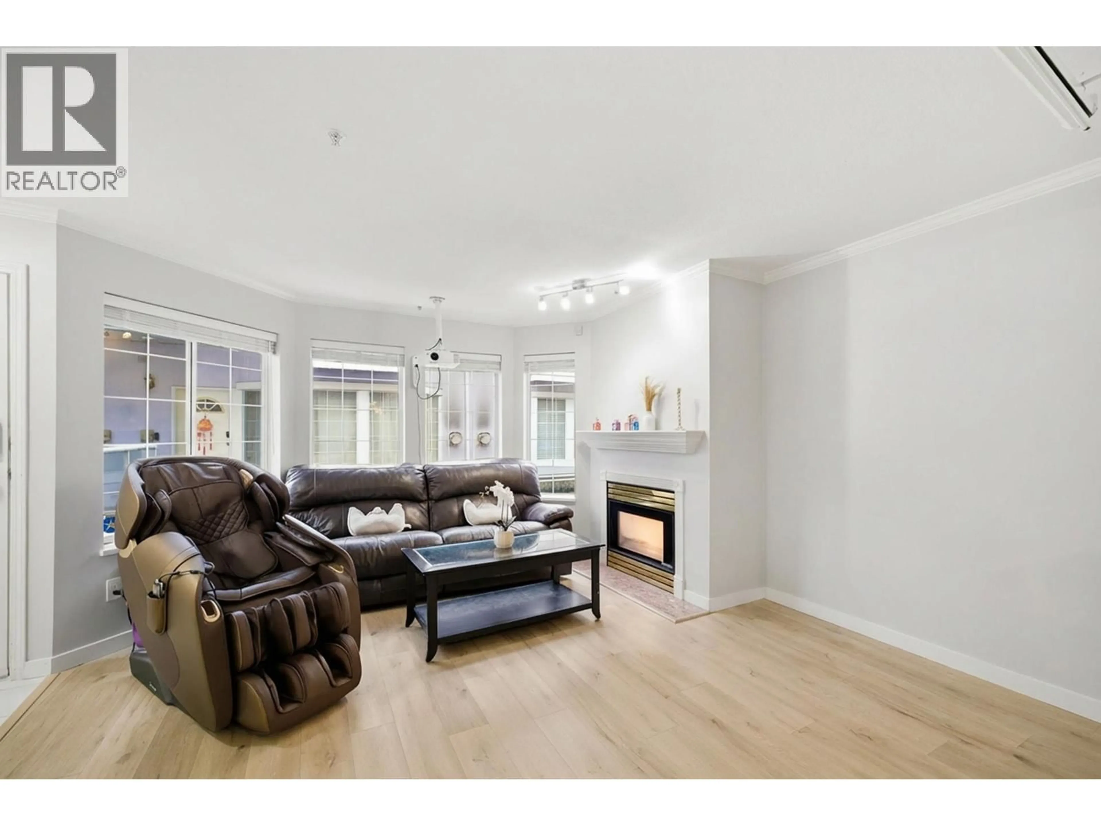 Living room with furniture, wood/laminate floor for 18 - 8711 JONES ROAD, Richmond British Columbia V6Y1L7