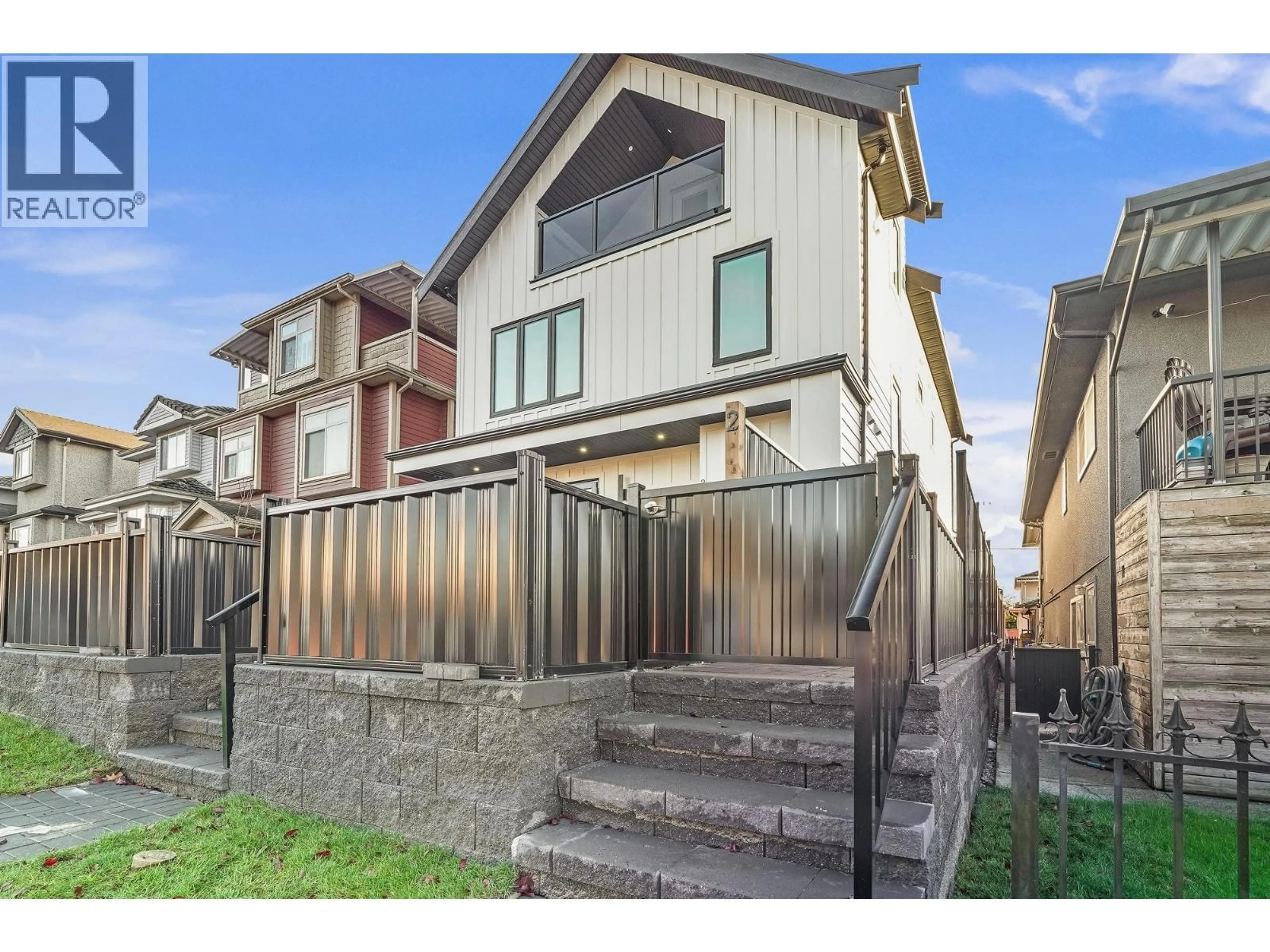 Home with vinyl exterior material, street for 2 - 3310 VENABLES STREET, Vancouver British Columbia V5K2S8