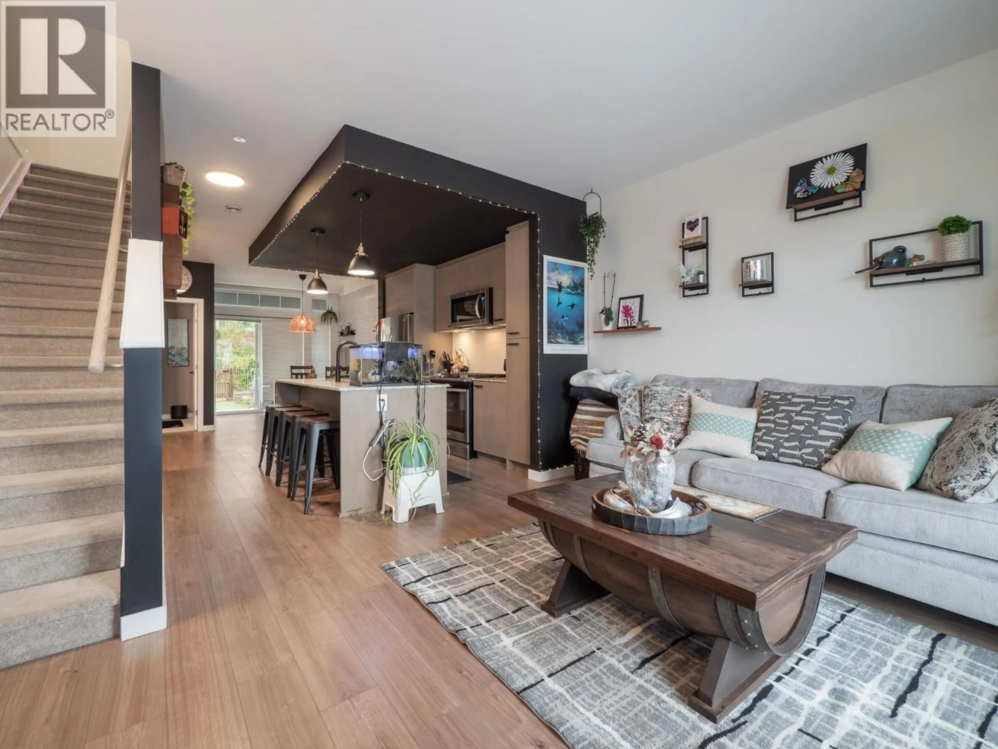 Living room with furniture, wood/laminate floor for 5934 OLDMILL LANE, Sechelt British Columbia V7Z0S3