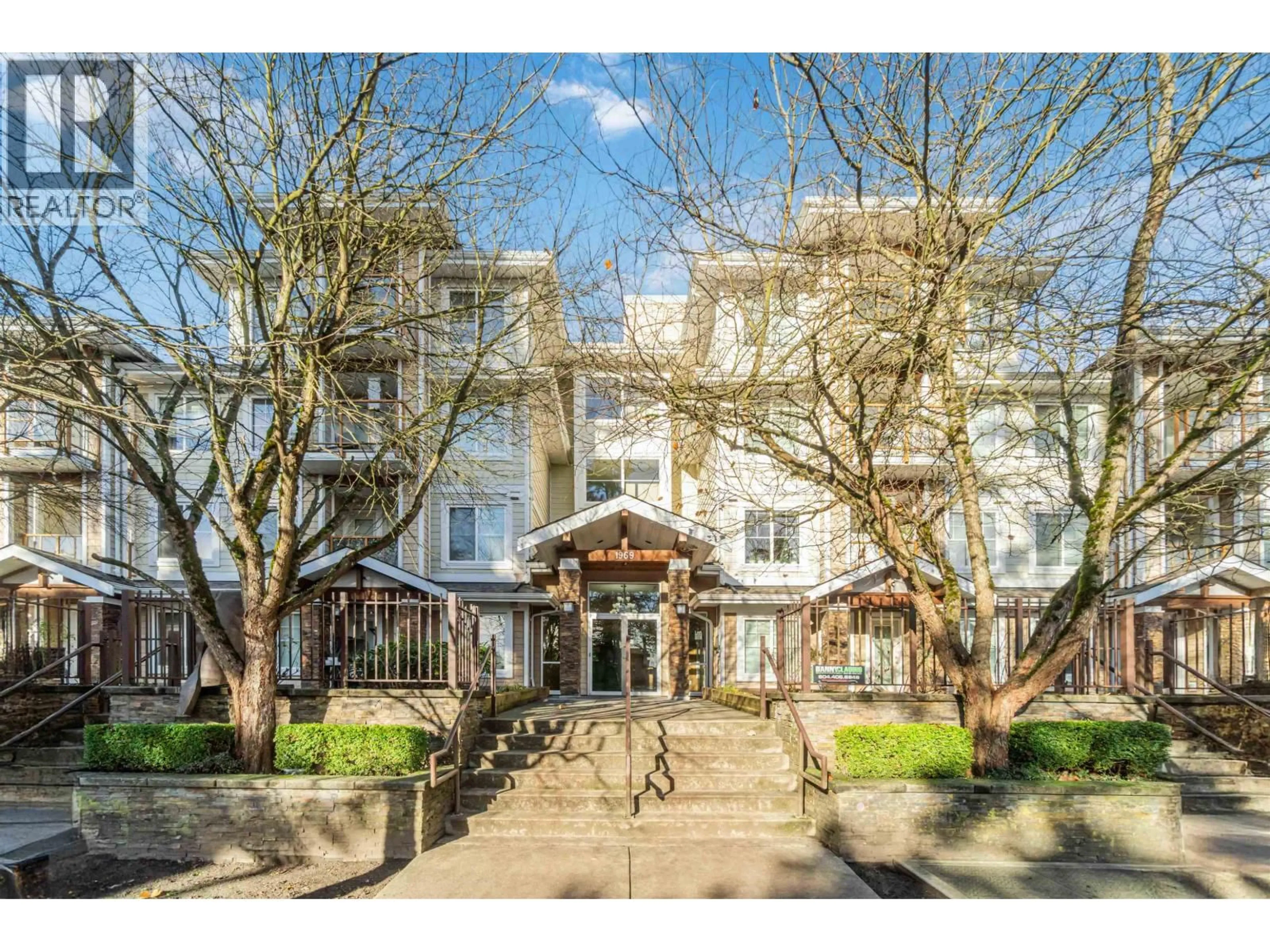 A pic from outside/outdoor area/front of a property/back of a property/a pic from drone, building for 209 - 1969 WESTMINSTER AVENUE, Port Coquitlam British Columbia V3B1E7