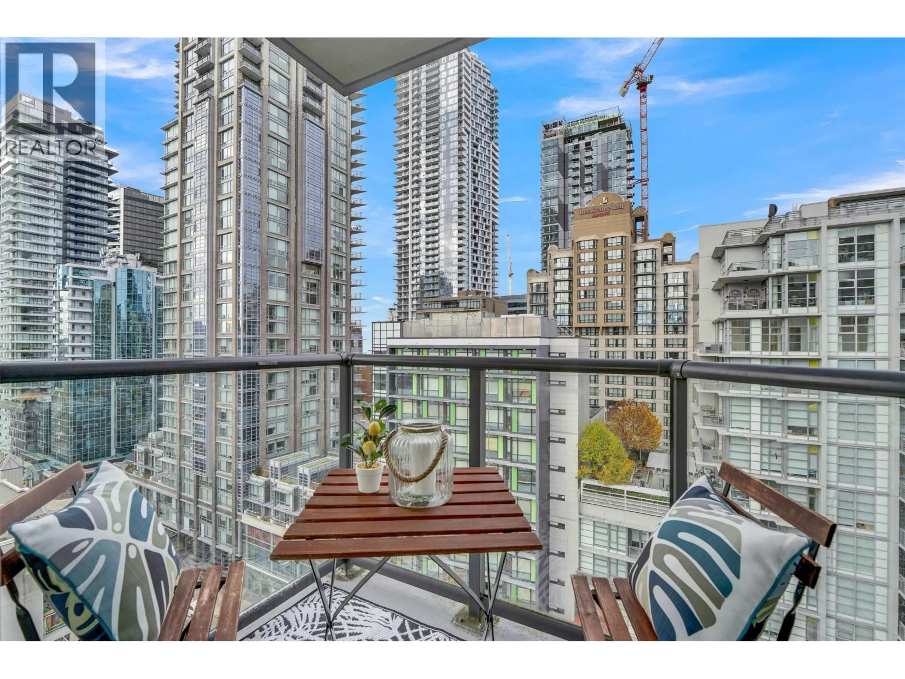 Balcony in the apartment, city buildings view from balcony for 1507 - 1212 HOWE STREET, Vancouver British Columbia V6Z2M9