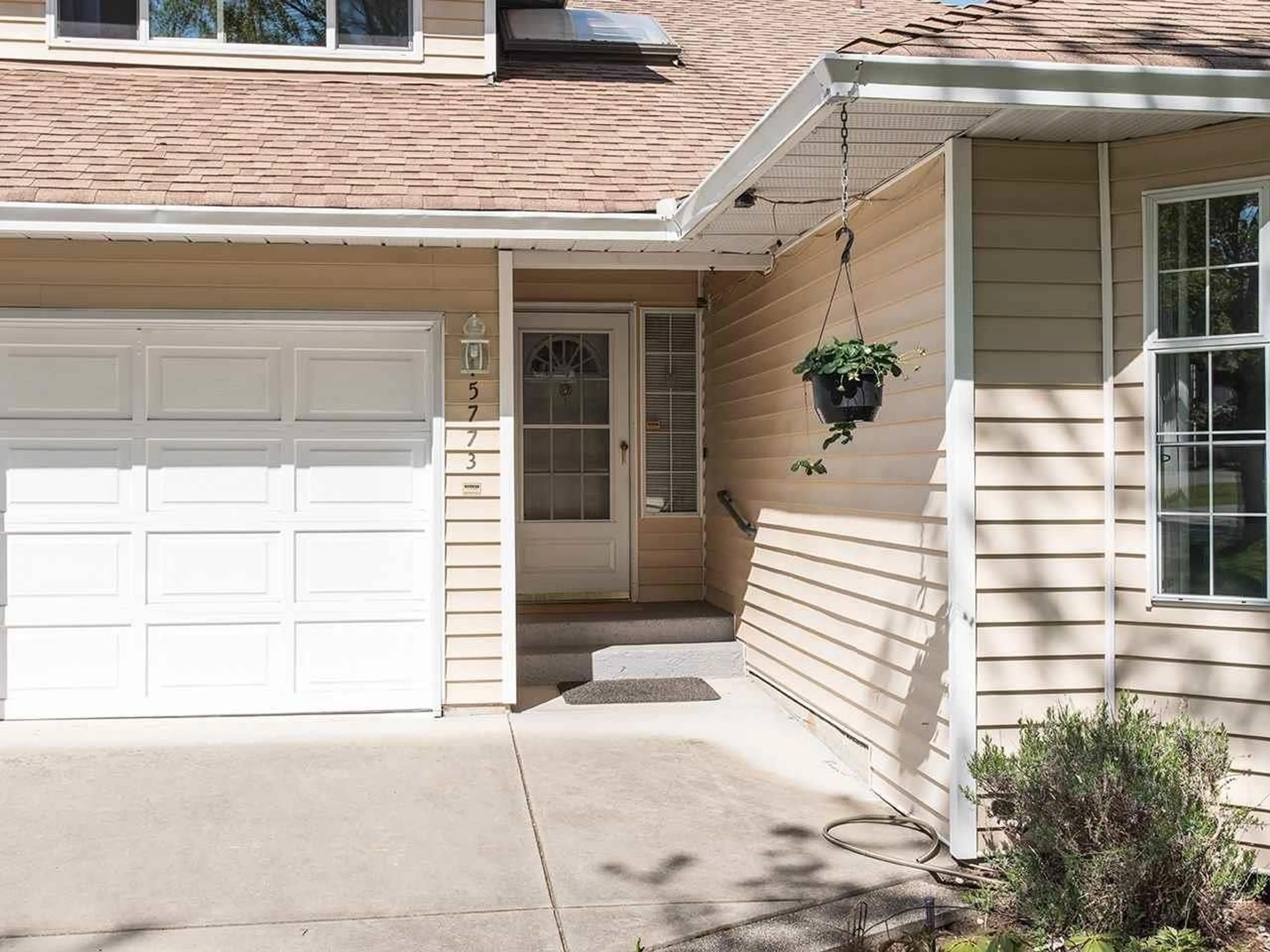 Home with vinyl exterior material, street for 15773 97A AVENUE, Surrey British Columbia V4N2V1