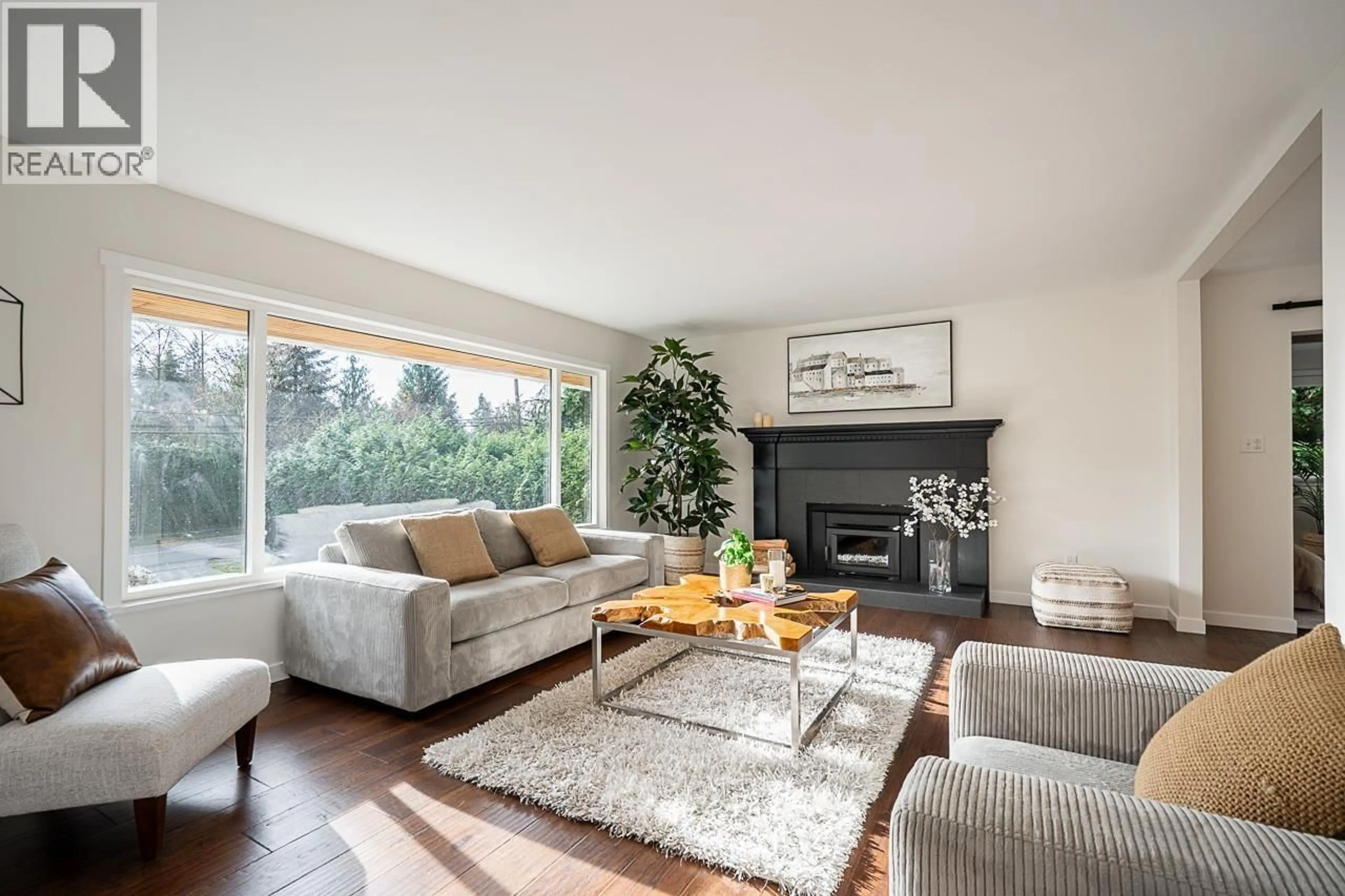 Living room with furniture, wood/laminate floor for 2519 EAST ROAD, Anmore British Columbia V3H5G9