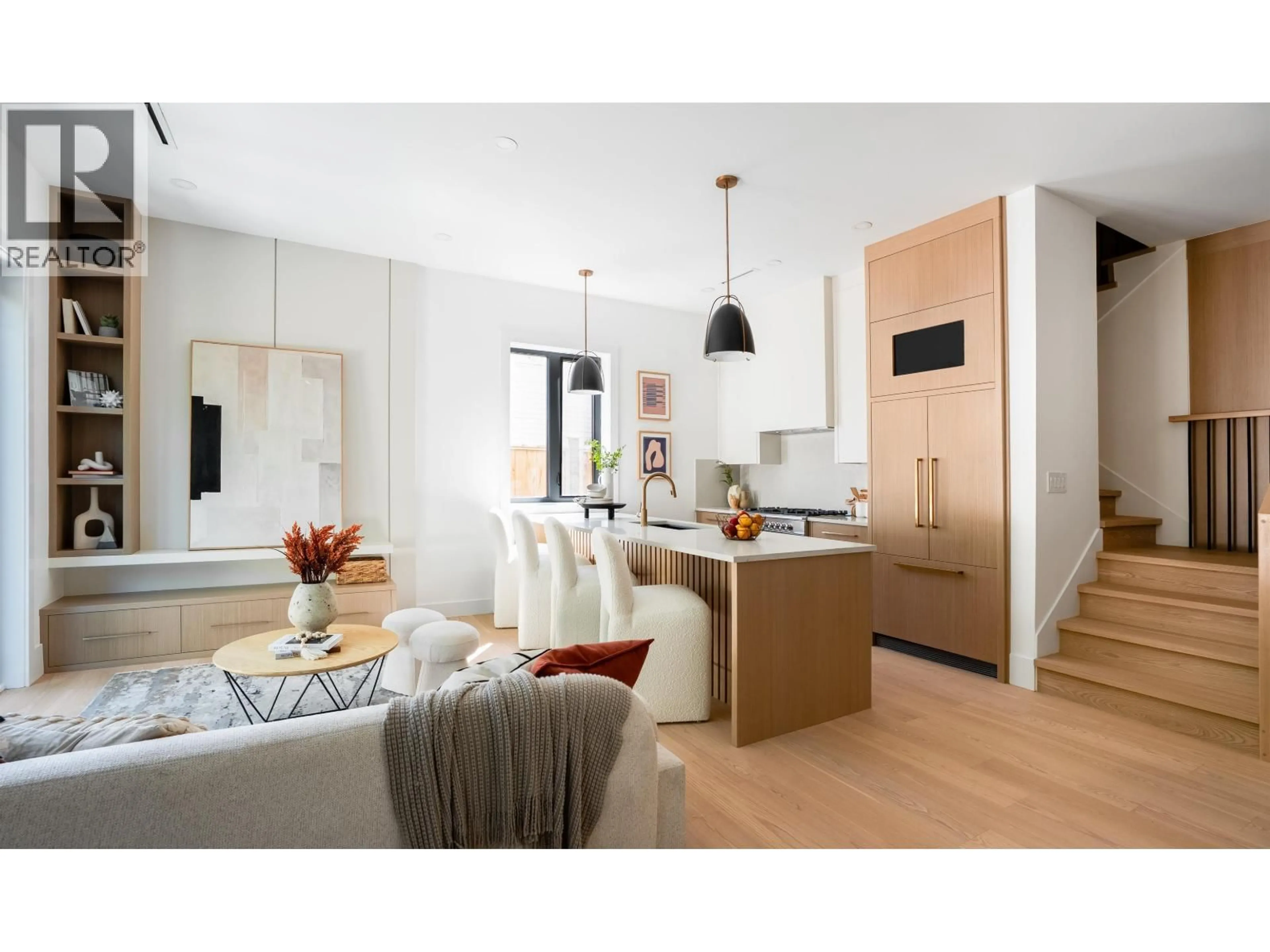 Open concept kitchen, wood/laminate floor for 1 - 356 40TH AVENUE, Vancouver British Columbia V5W1L9