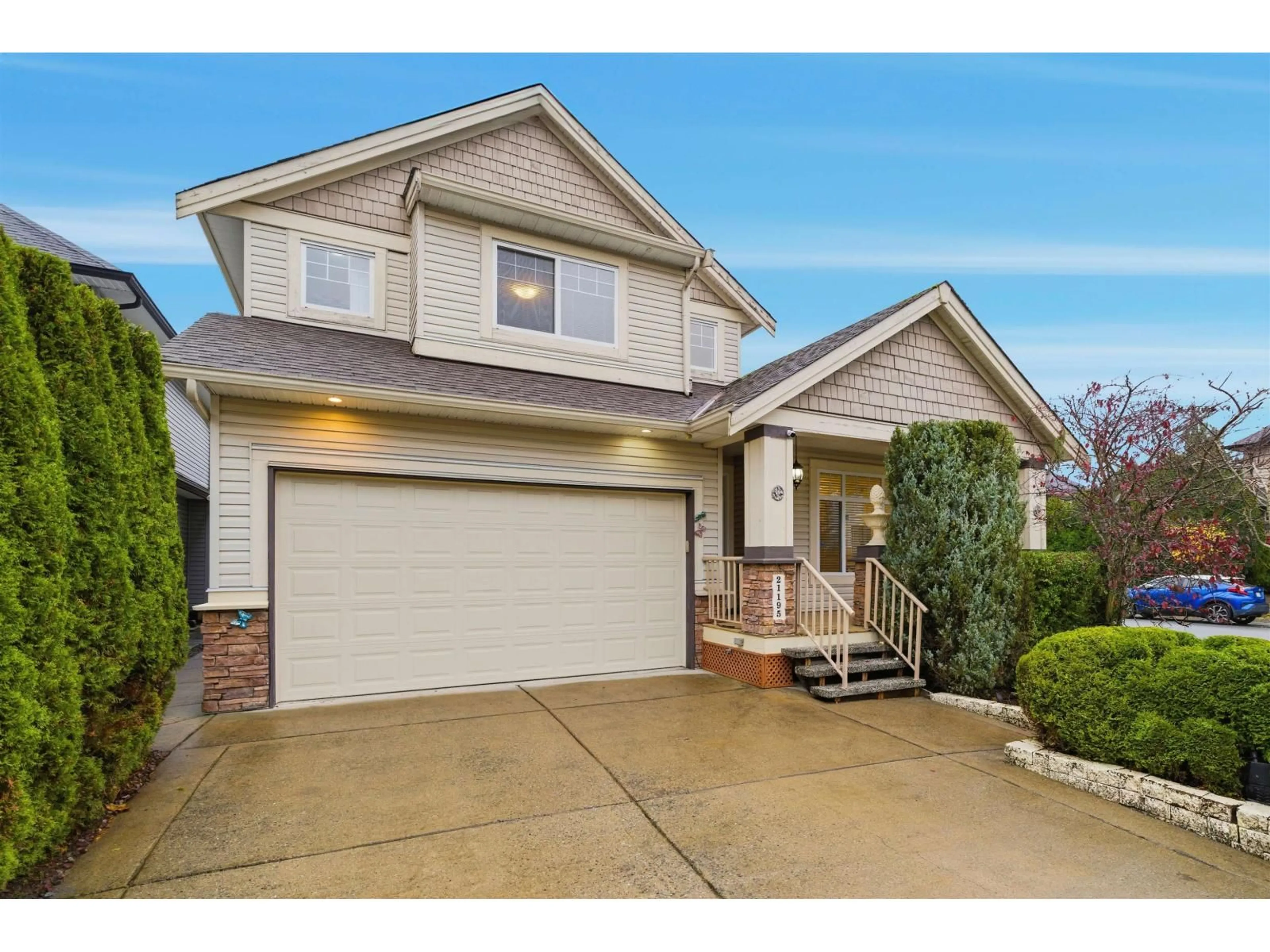 Home with vinyl exterior material, street for 21195 83A AVENUE, Langley British Columbia V2Y0C4