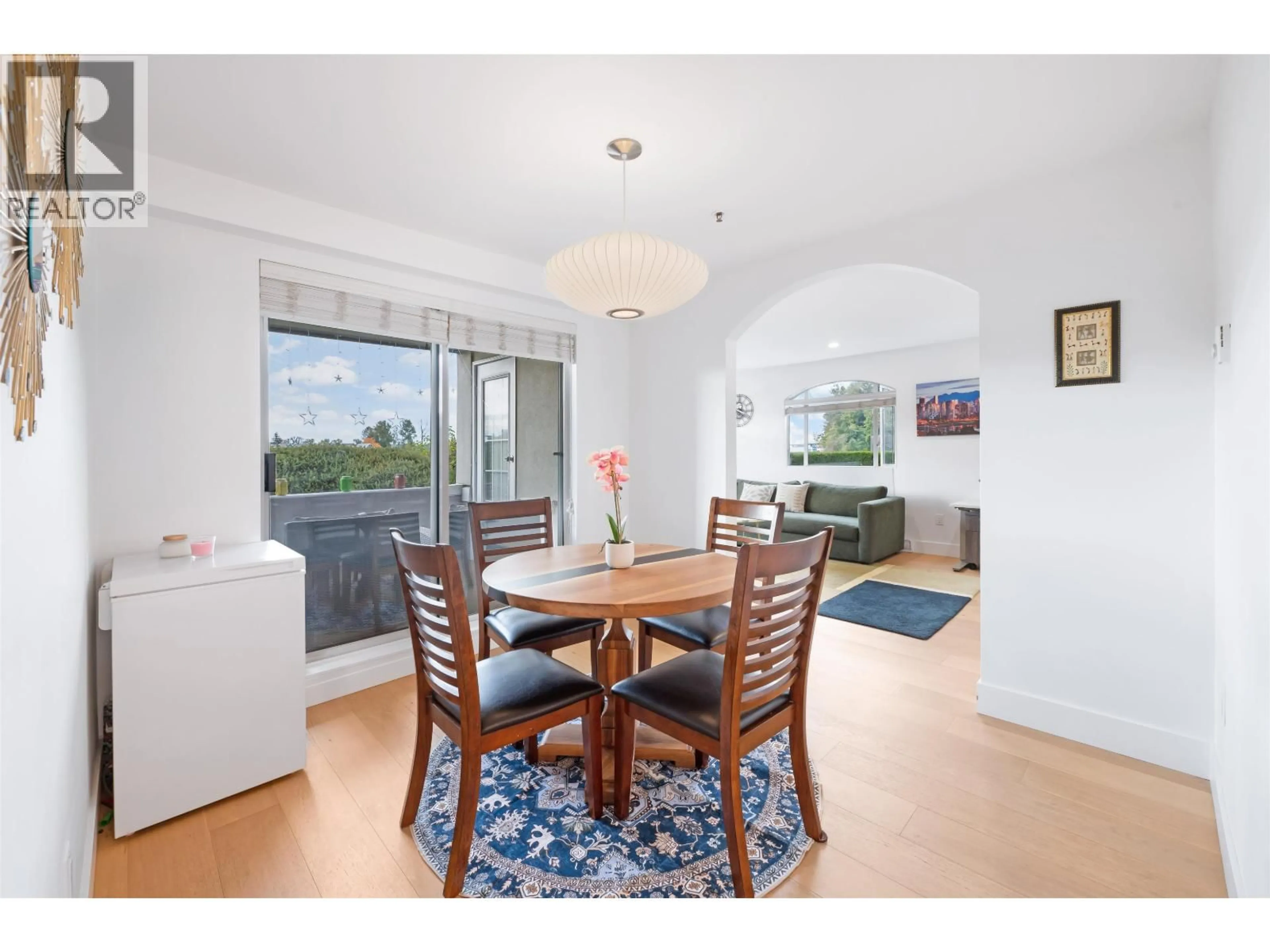 Dining room, wood/laminate floor for 105 - 2 RENAISSANCE SQUARE, New Westminster British Columbia V3M6K3